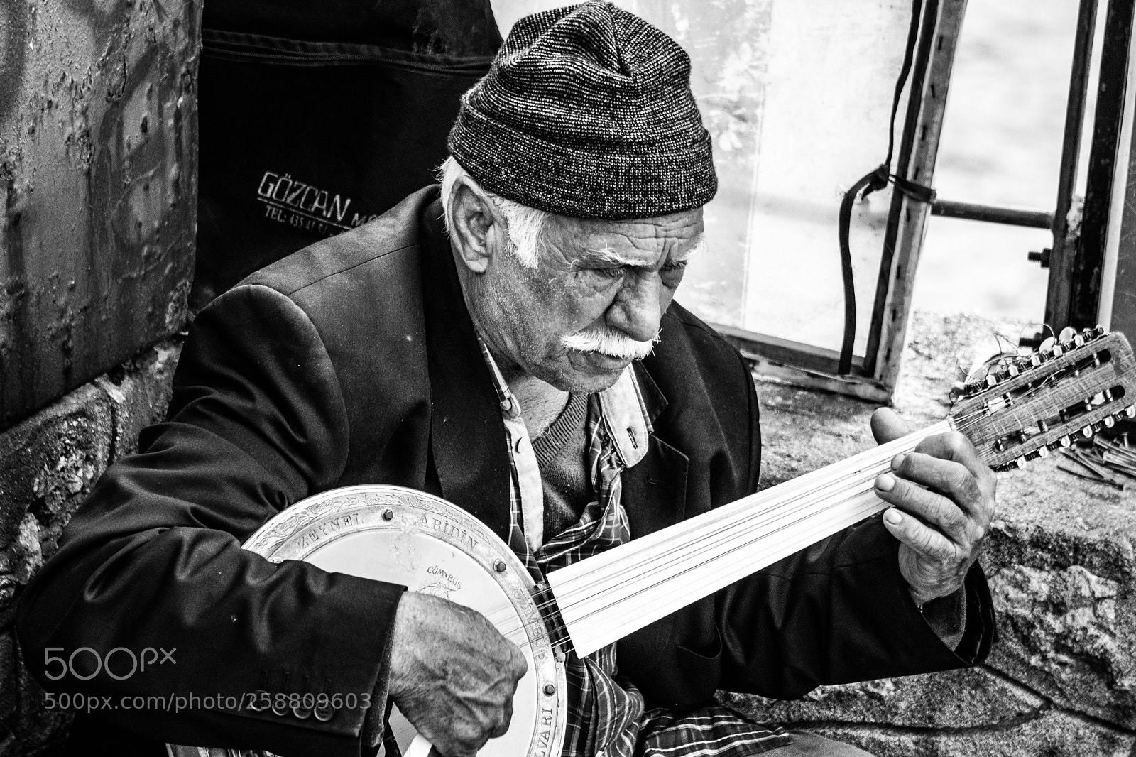 Sony a6500 sample photo. Old man playing guitar photography