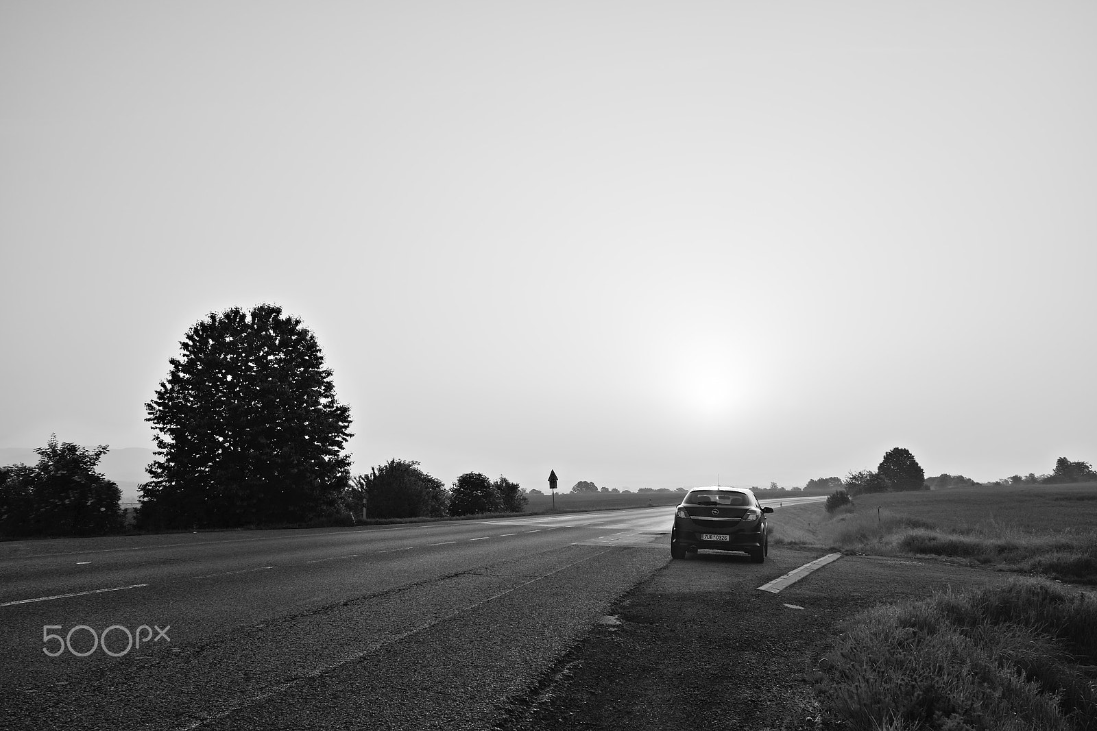 Nikon D5300 sample photo. Ceske stredohori, czech republic - may 19, 2018: black car opel astra h stand near asphalt road... photography