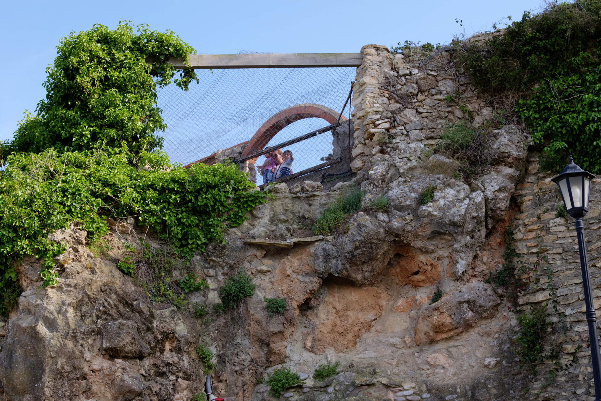 Nikon D5300 + Nikon AF-S DX Nikkor 35mm F1.8G sample photo. Rocks close to village photography
