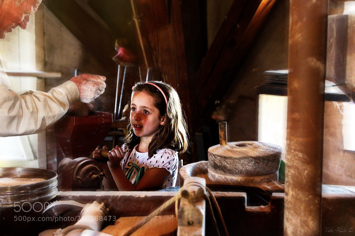 Panasonic Lumix DMC-LX100 sample photo. Child in windmill photography