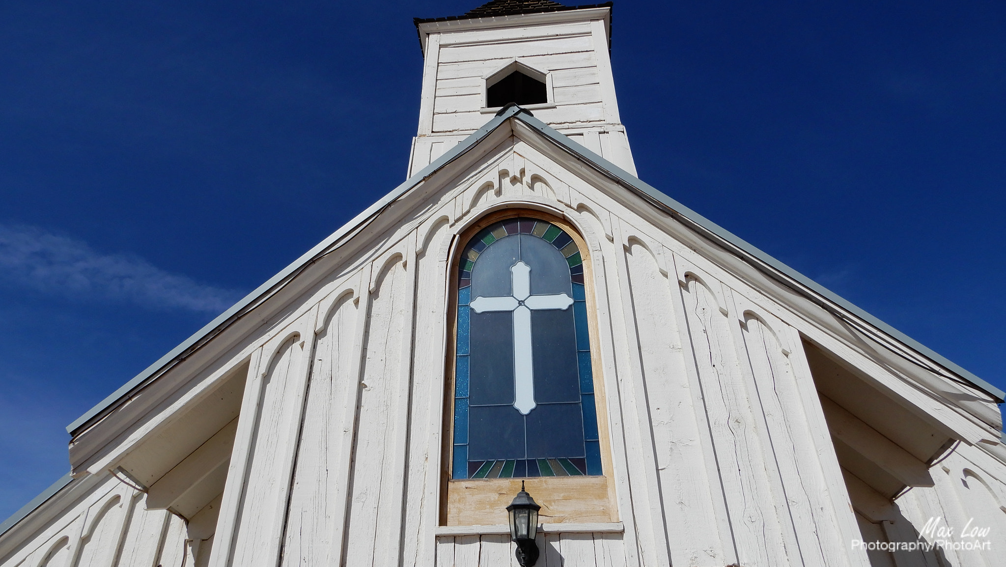 Nikon Coolpix A900 sample photo. The cross photography