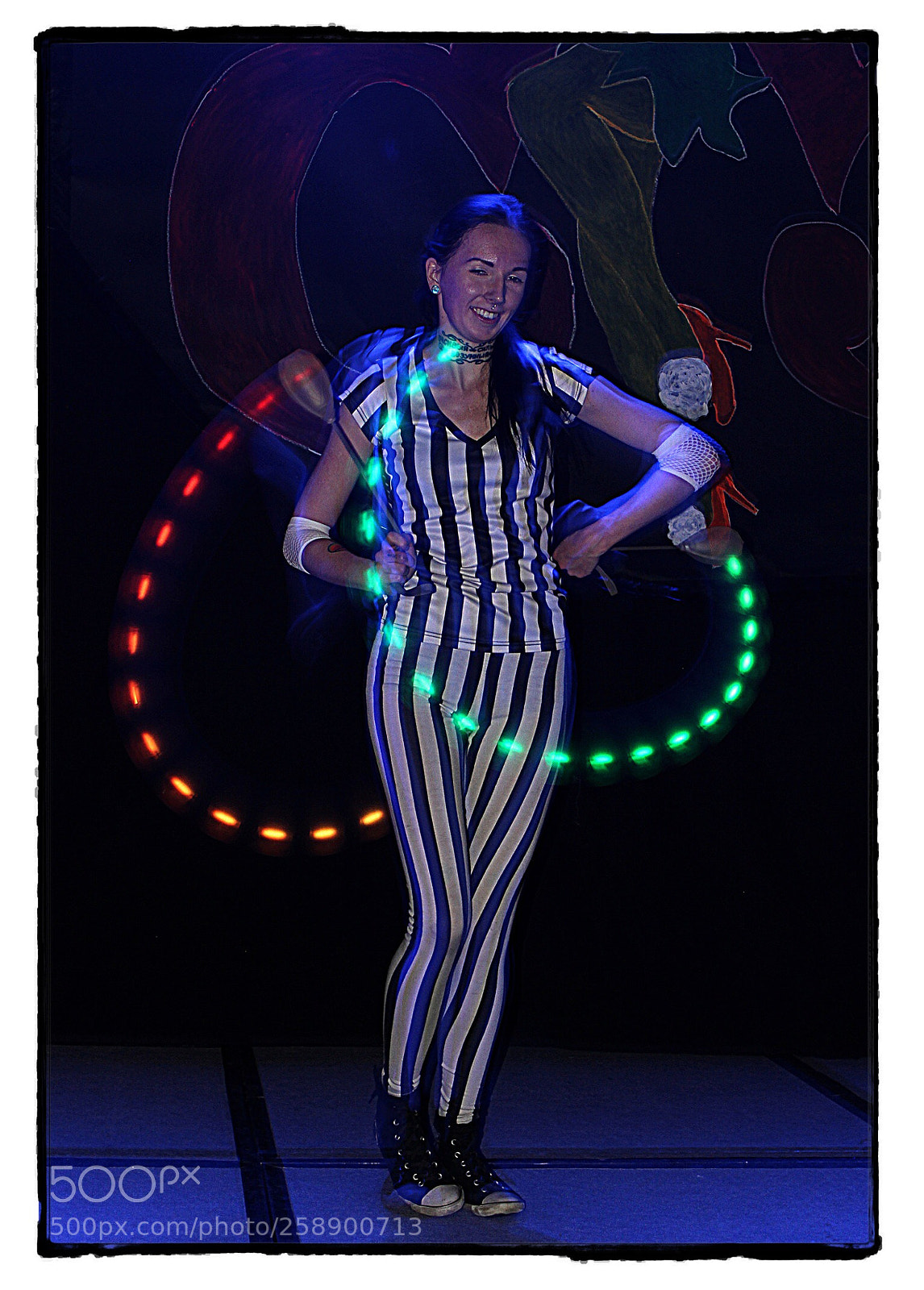 Canon EOS 7D sample photo. Performer spinning colored balls photography