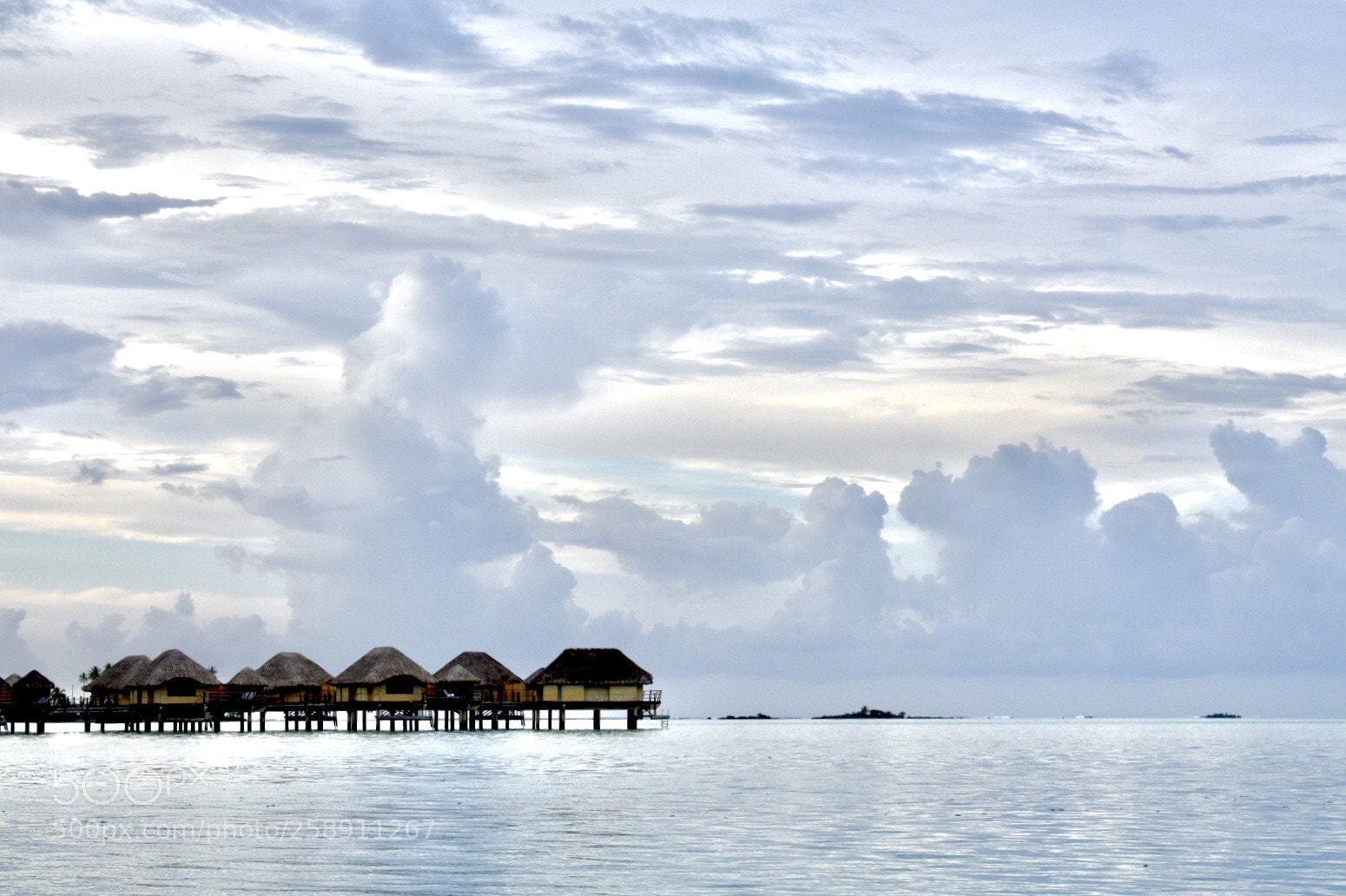 Nikon D3400 sample photo. Clouds and bungalows photography