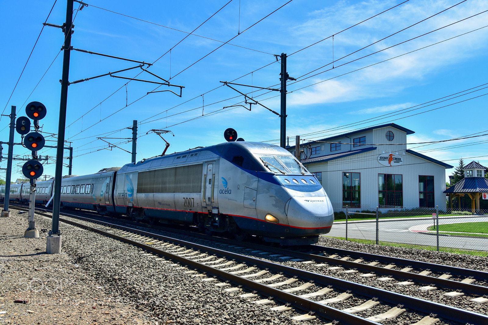 Nikon D750 sample photo. Acela moving past the photography