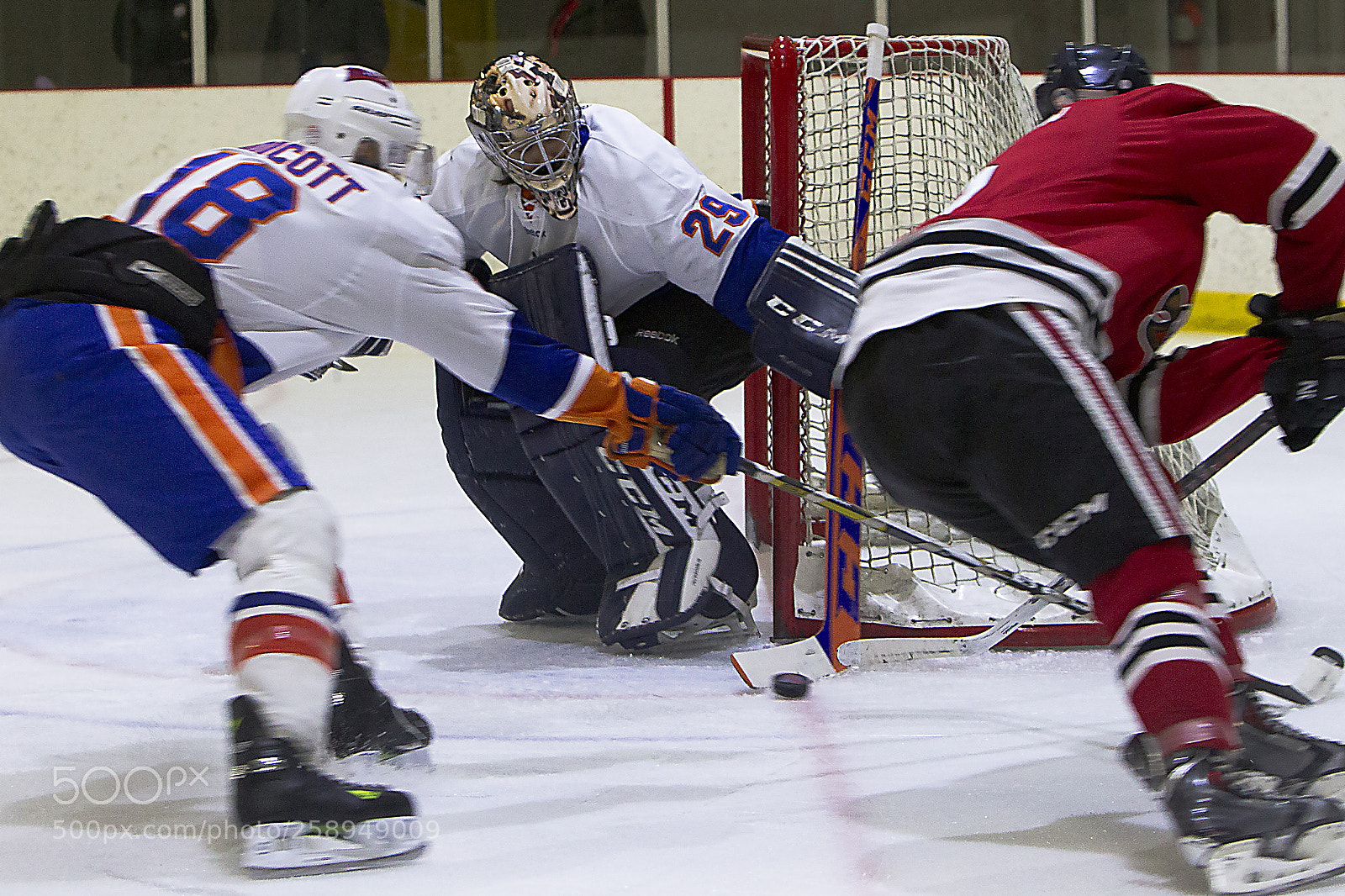 Canon EOS-1D Mark IV sample photo. Two around goaltender photography