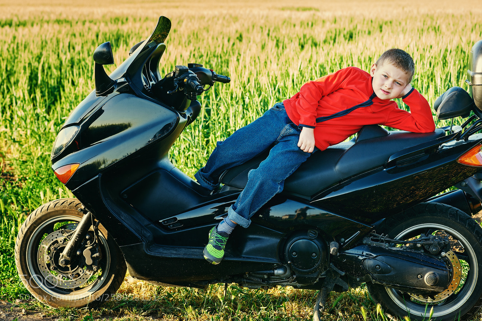 Nikon D700 sample photo. Boy sitting on his photography