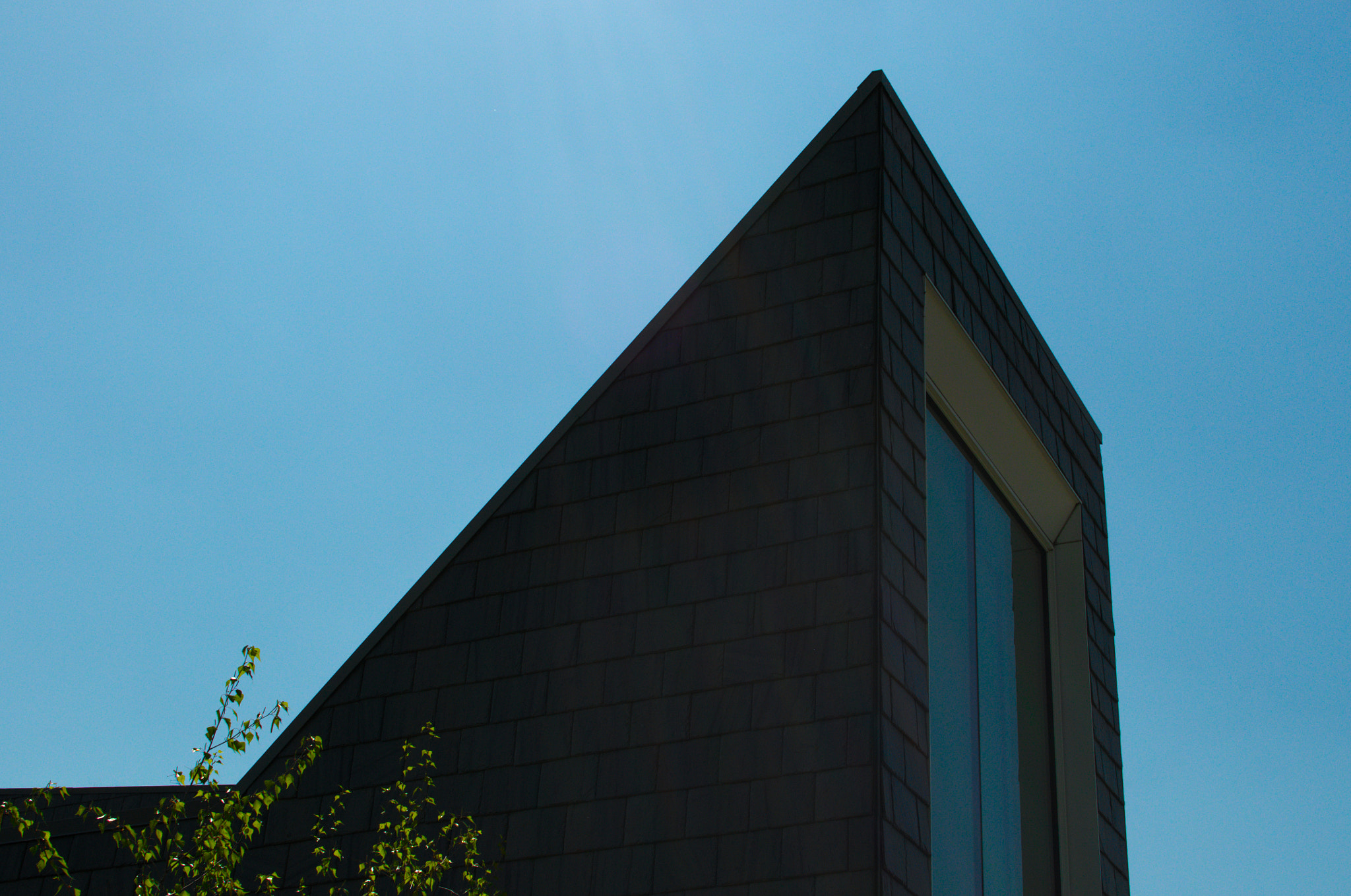 Nikon D300 + Nikon AF-S DX Nikkor 35mm F1.8G sample photo. Building with slate stone exterior photography