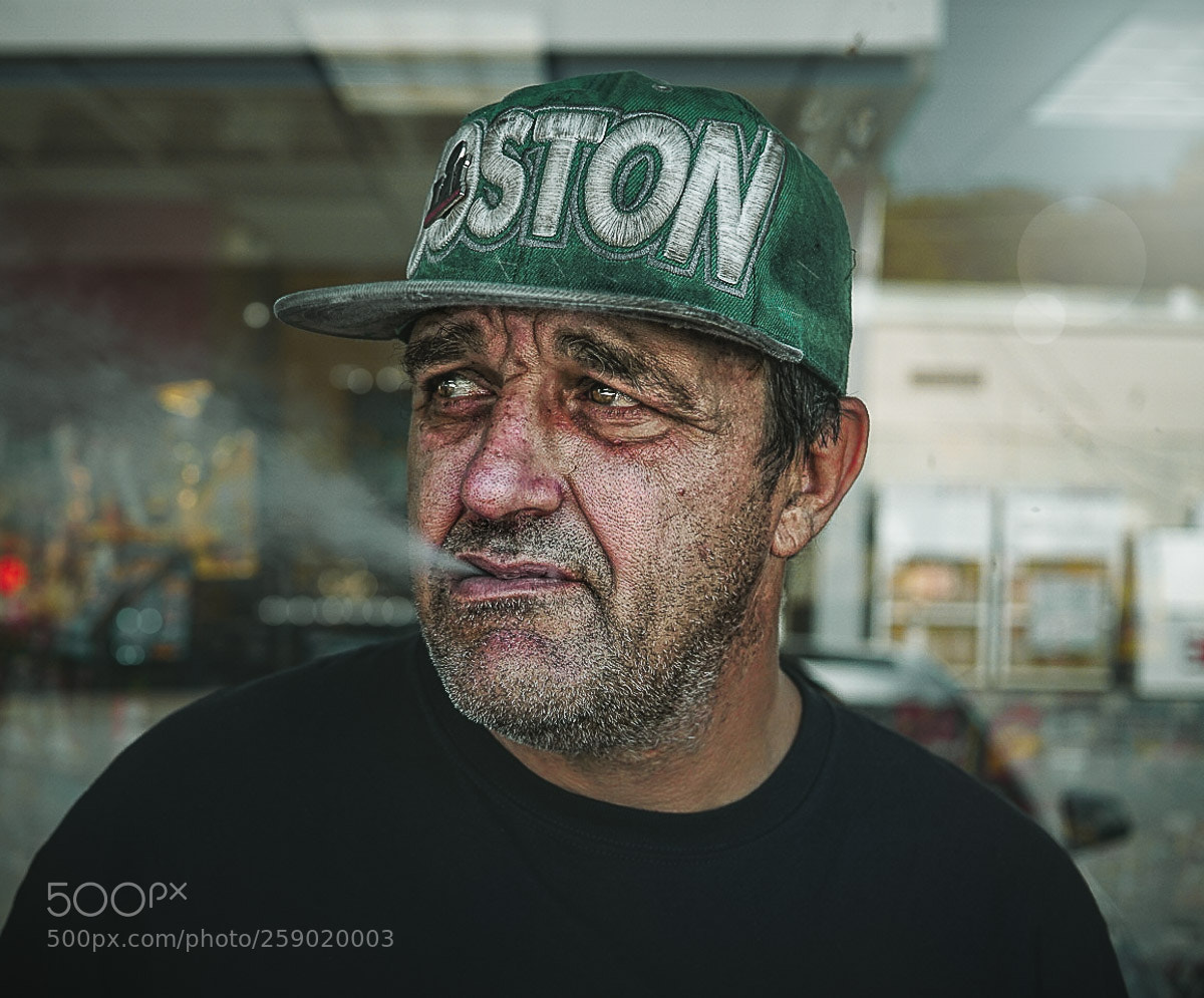Sony a6000 sample photo. Homeless man in the photography