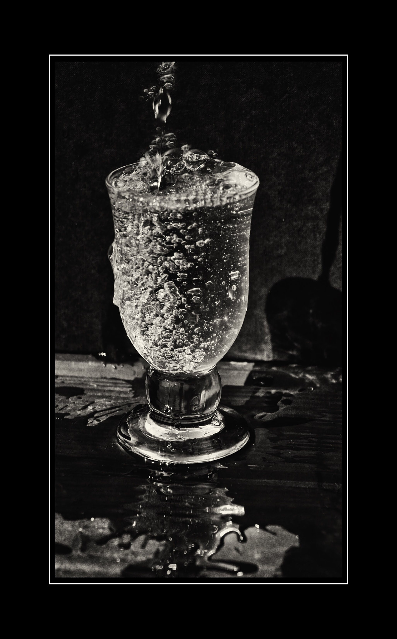 Olympus PEN E-PL5 sample photo. The glass over flows photography