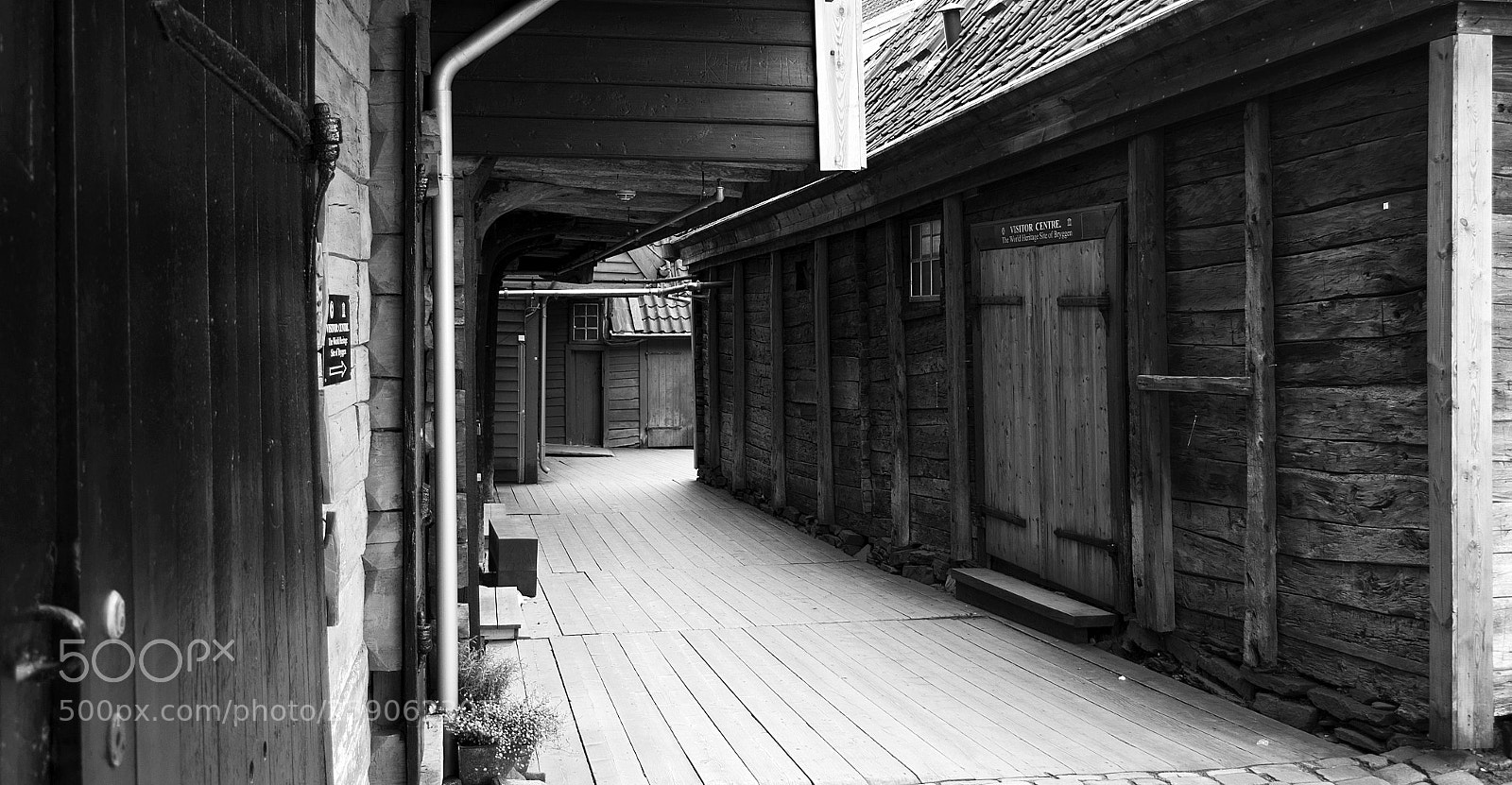 Pentax K-50 sample photo. Wood houses bn photography
