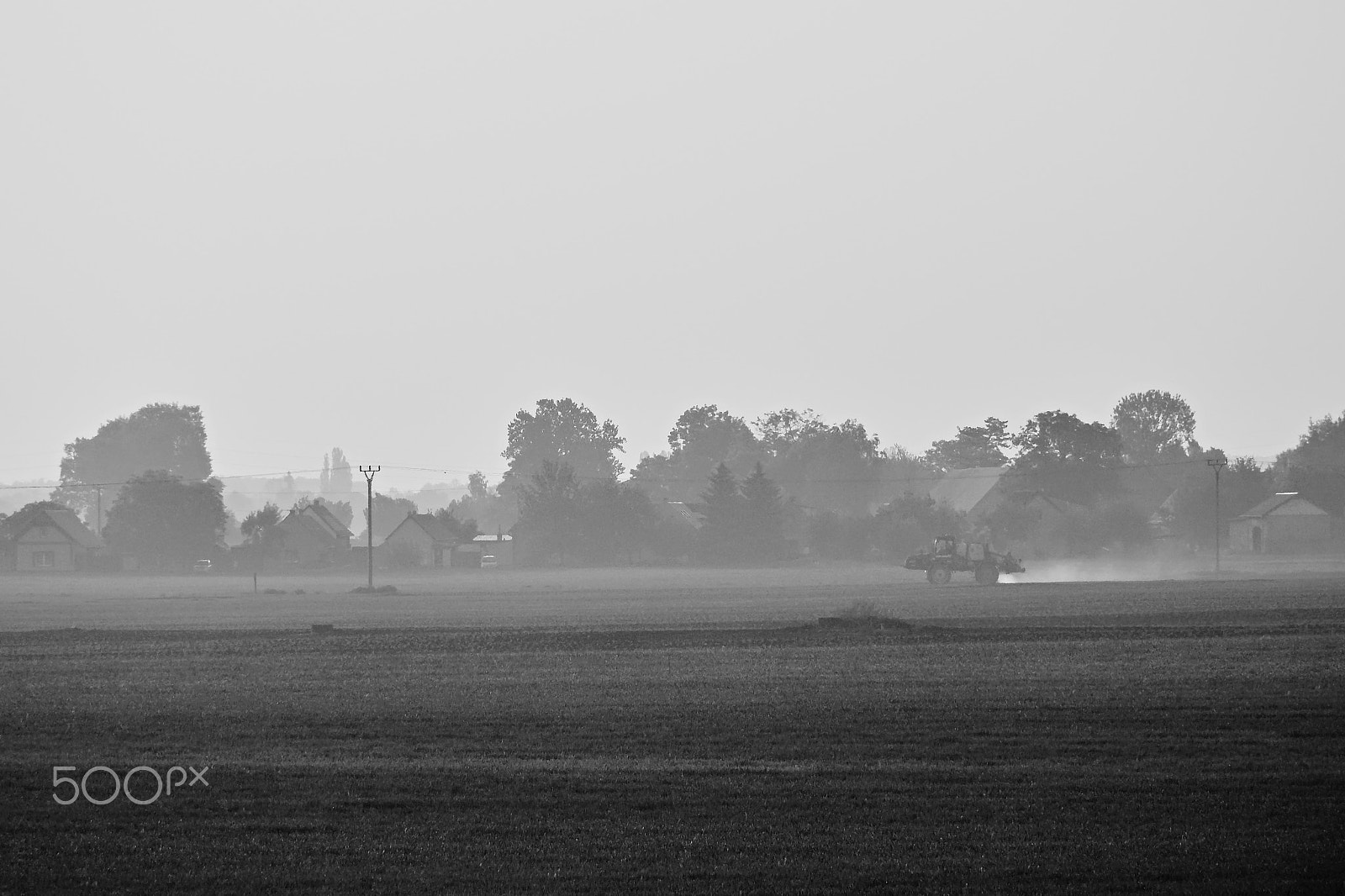 Nikon D5300 sample photo. Agricultural machine working in field in front of nove kopisty village in spring czech central... photography