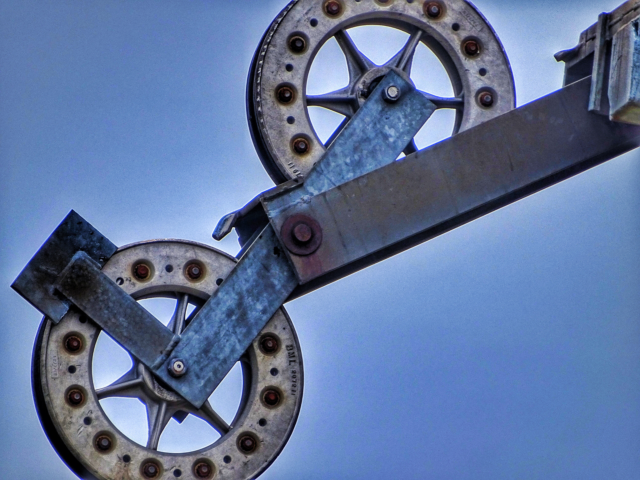 Sony Cyber-shot DSC-HX350 sample photo. Guide wheels on an old abandoned ski lift photography