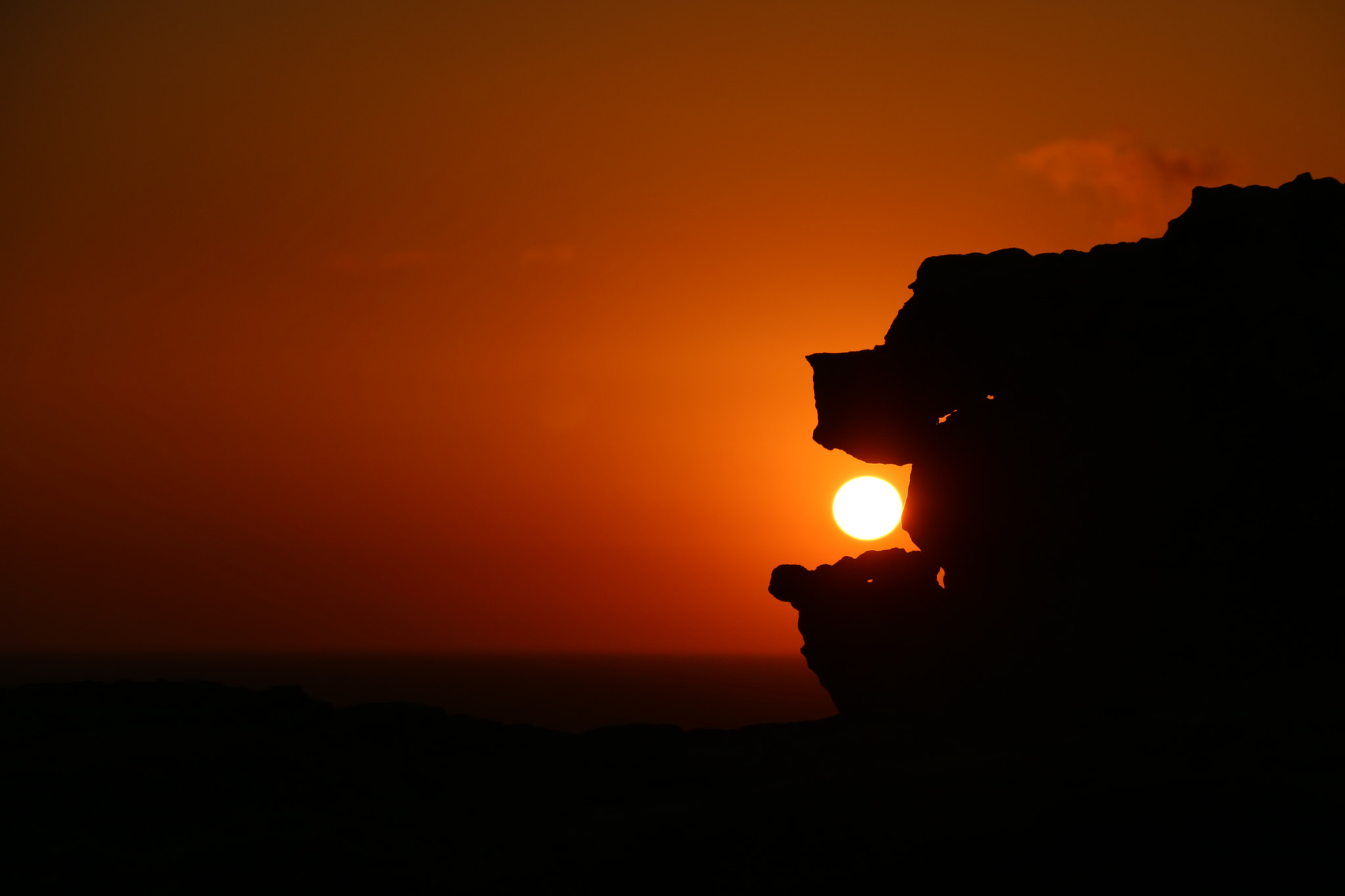 Canon EOS M3 + Canon EF-S 18-200mm F3.5-5.6 IS sample photo. Rock devouring the sun photography