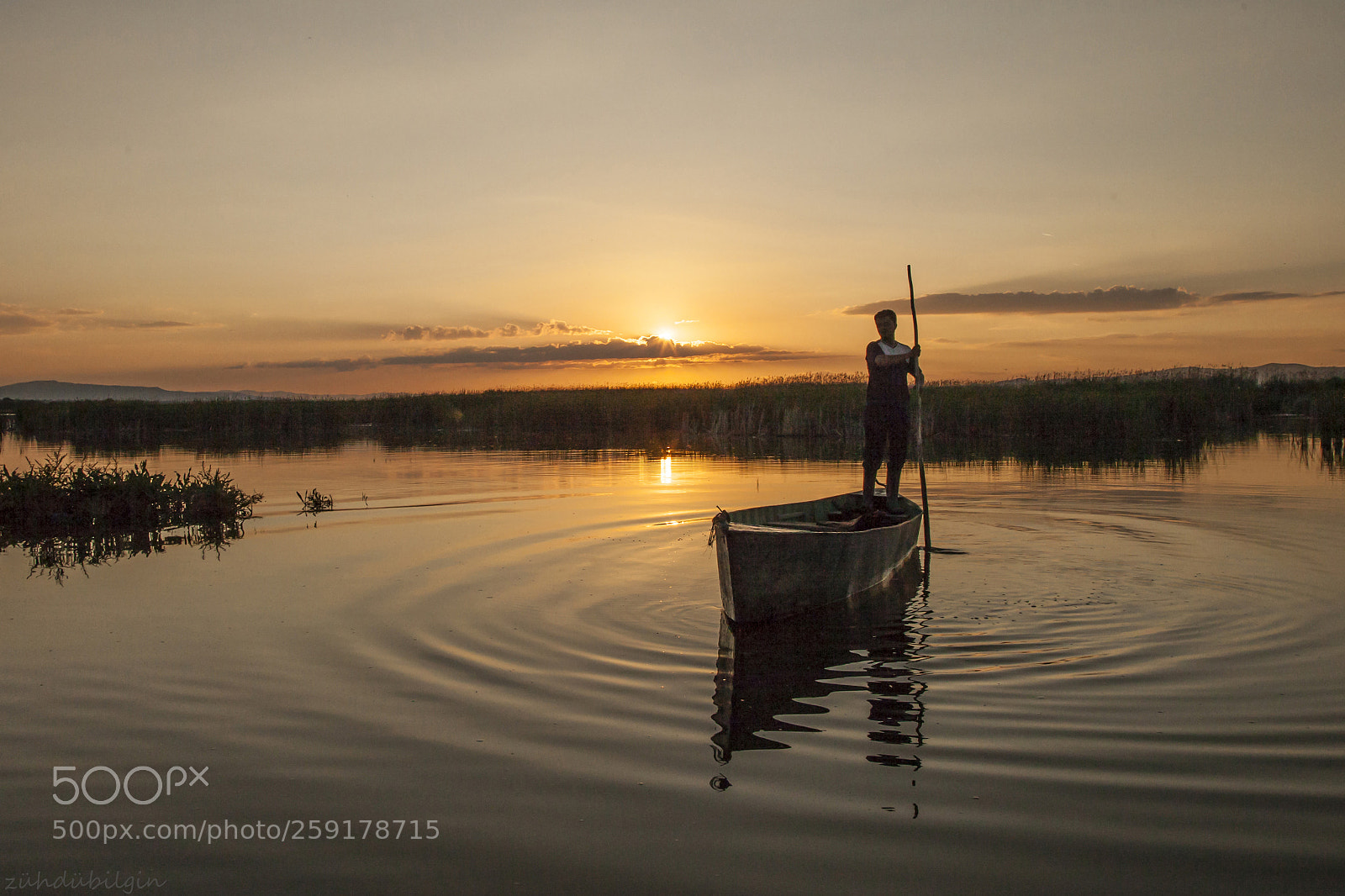 Canon EOS 5D Mark II sample photo. Boatman at sunset photography
