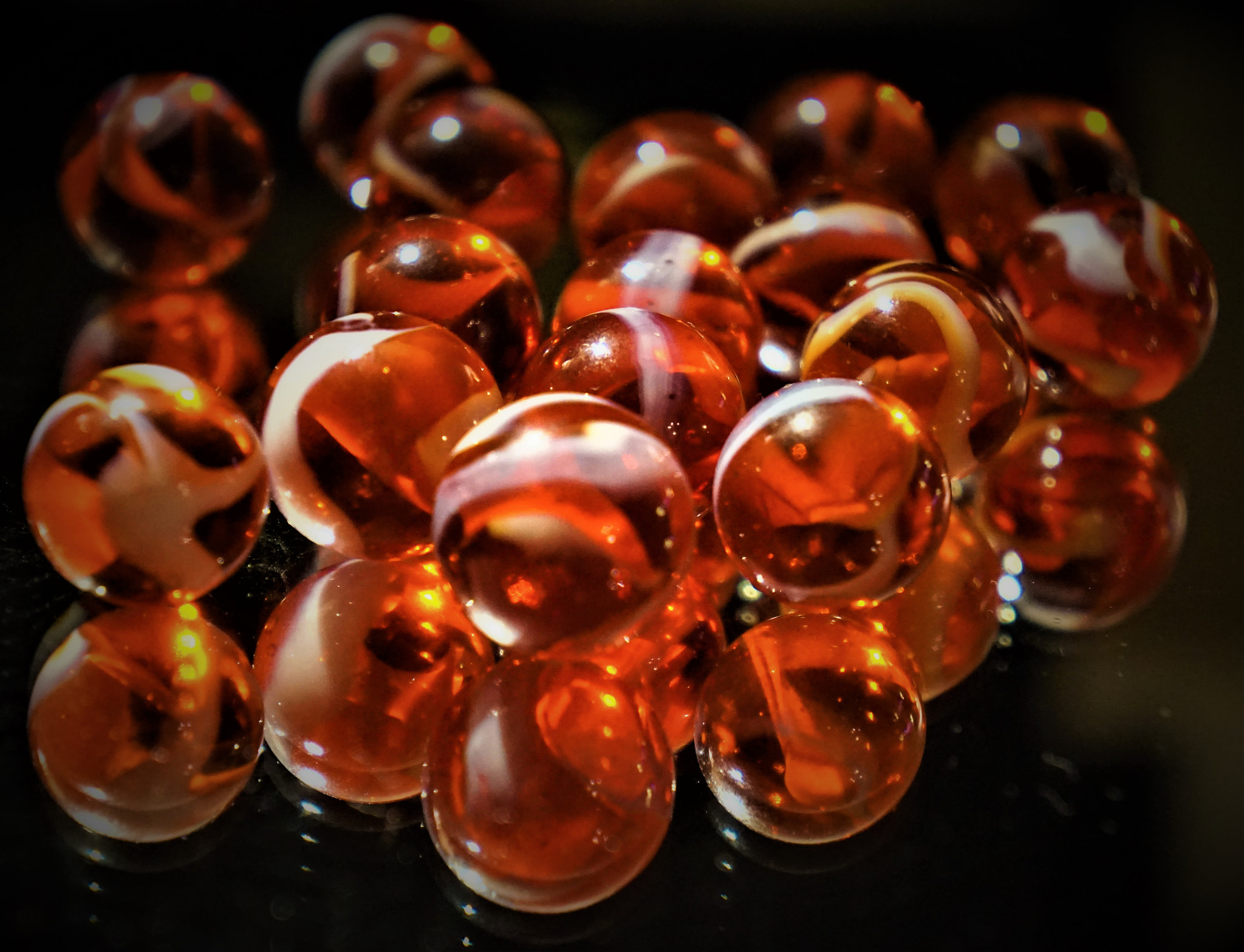 Sony E 18-55mm F3.5-5.6 OSS sample photo. Red marbles on mirror photography