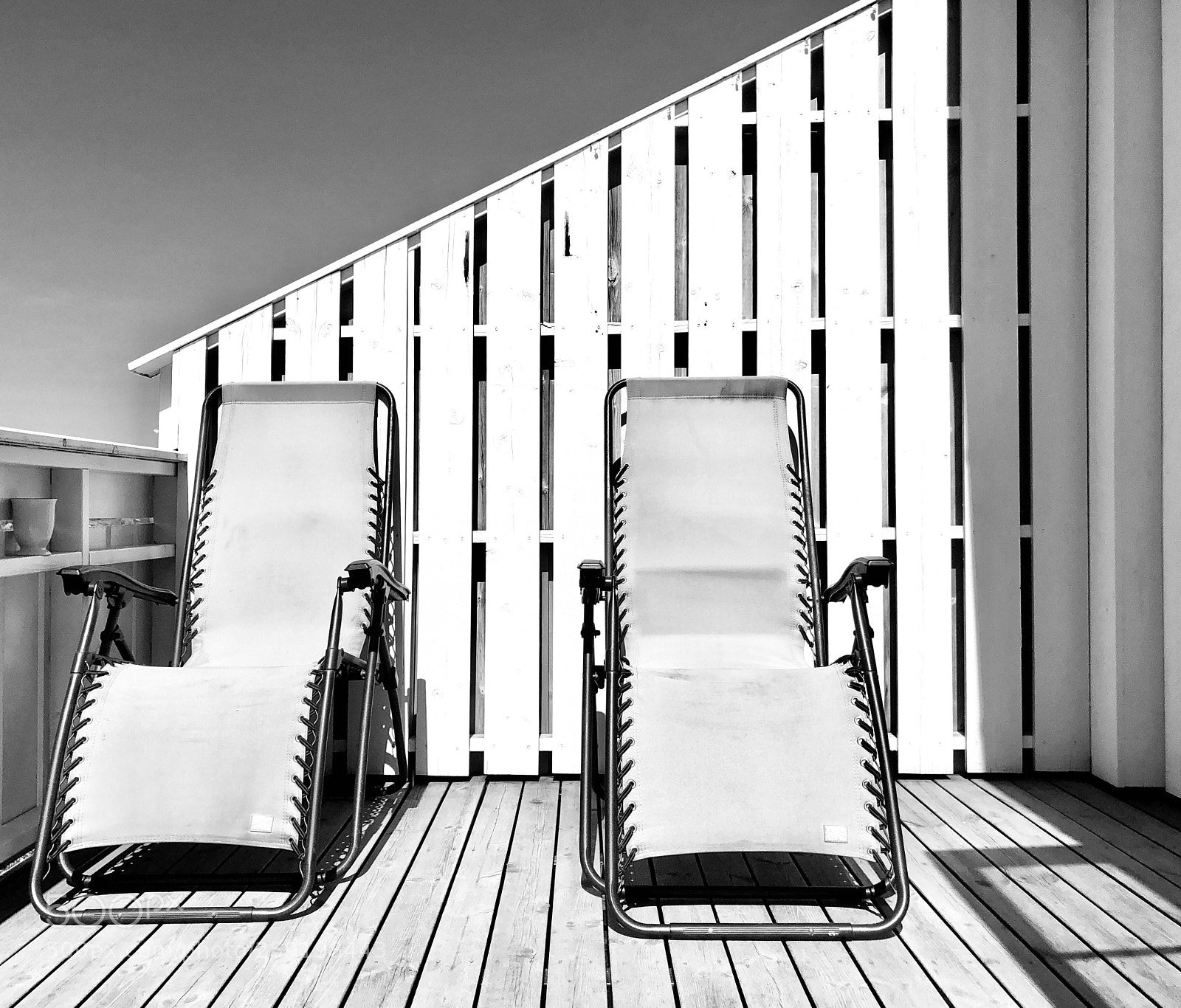Apple iPhone 8 Plus sample photo. Two empty deck chairs photography