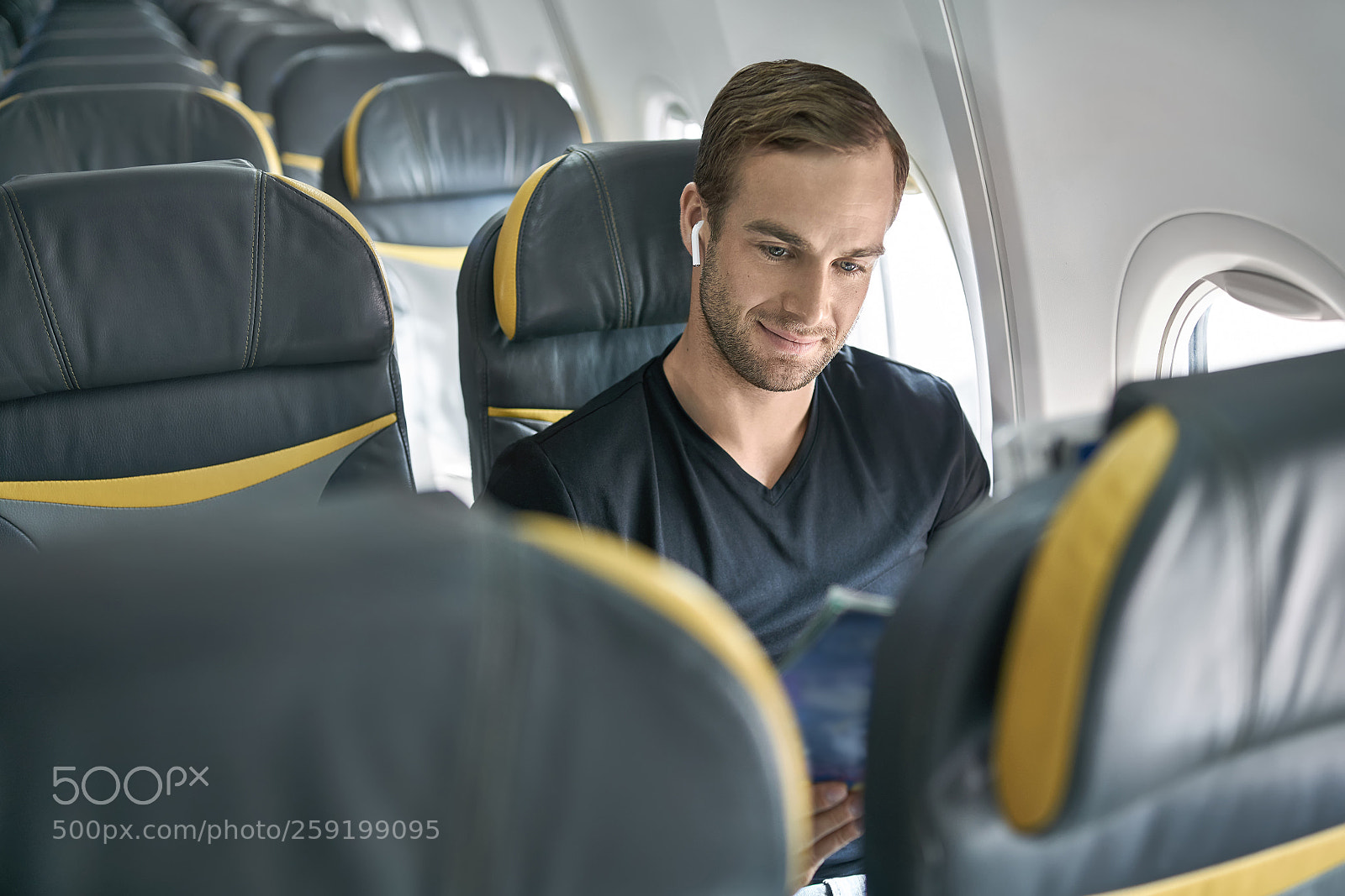 Sony a7R II sample photo. Handsome guy in airplane photography