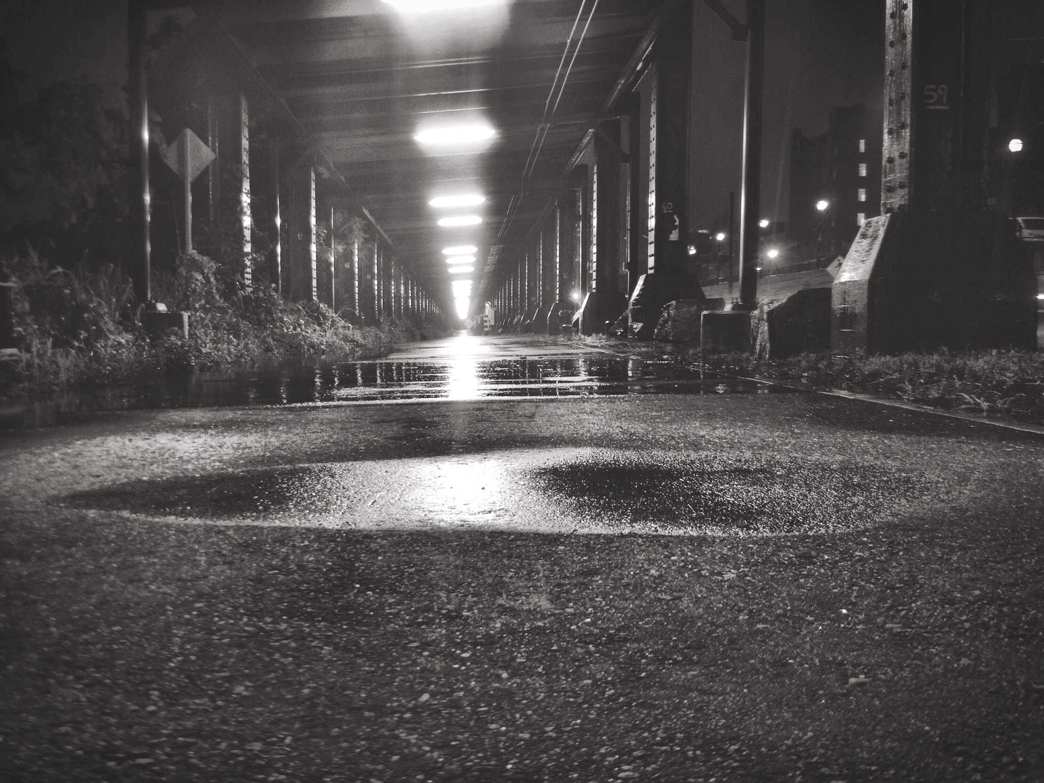 Apple iPhone sample photo. Puddles light the way photography