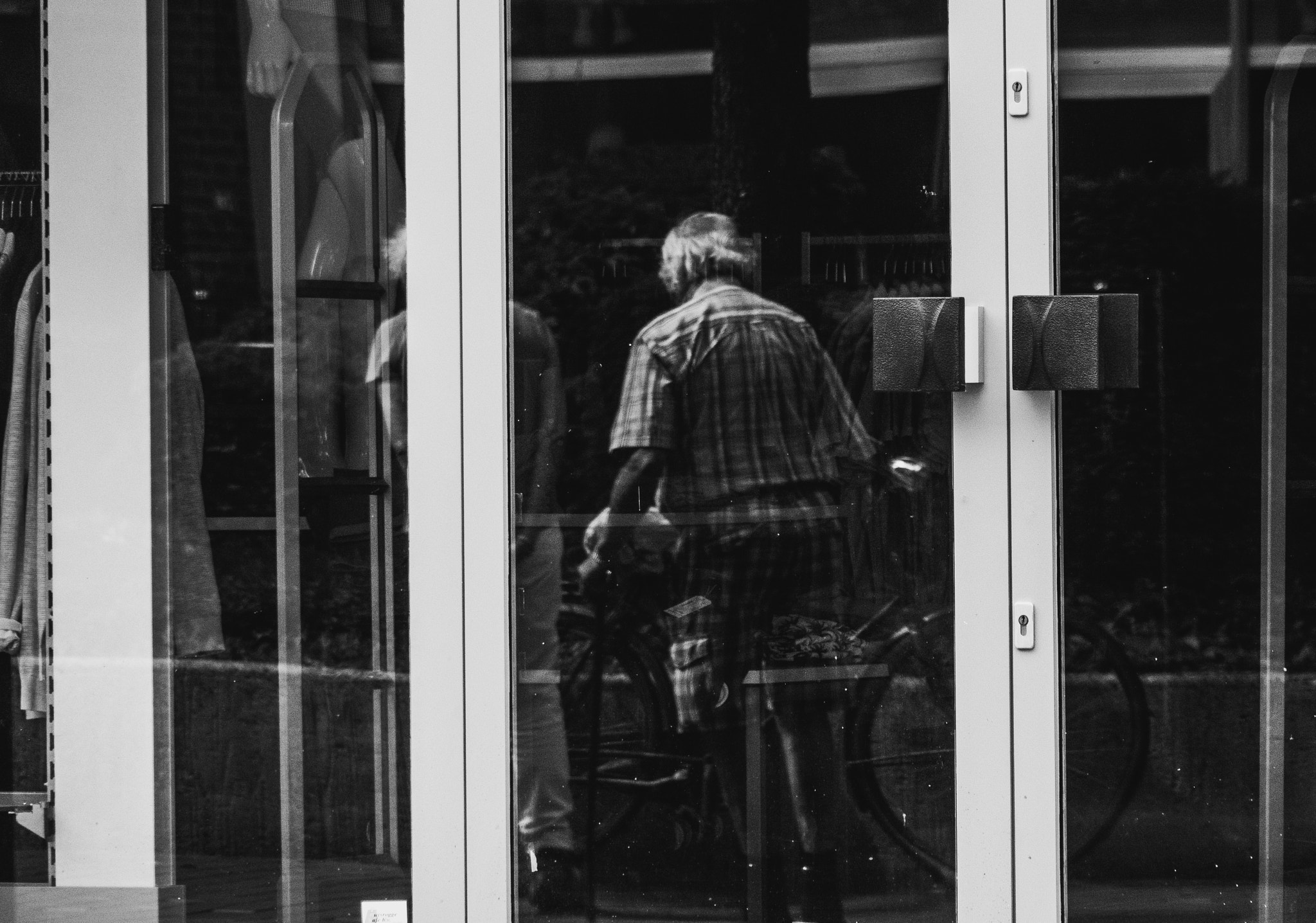 Olympus OM-D E-M10 III sample photo. Reflection in dirty windows photography