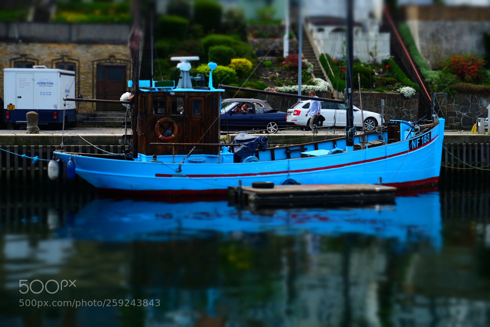Fujifilm X-T10 sample photo. Blue fishing boat photography