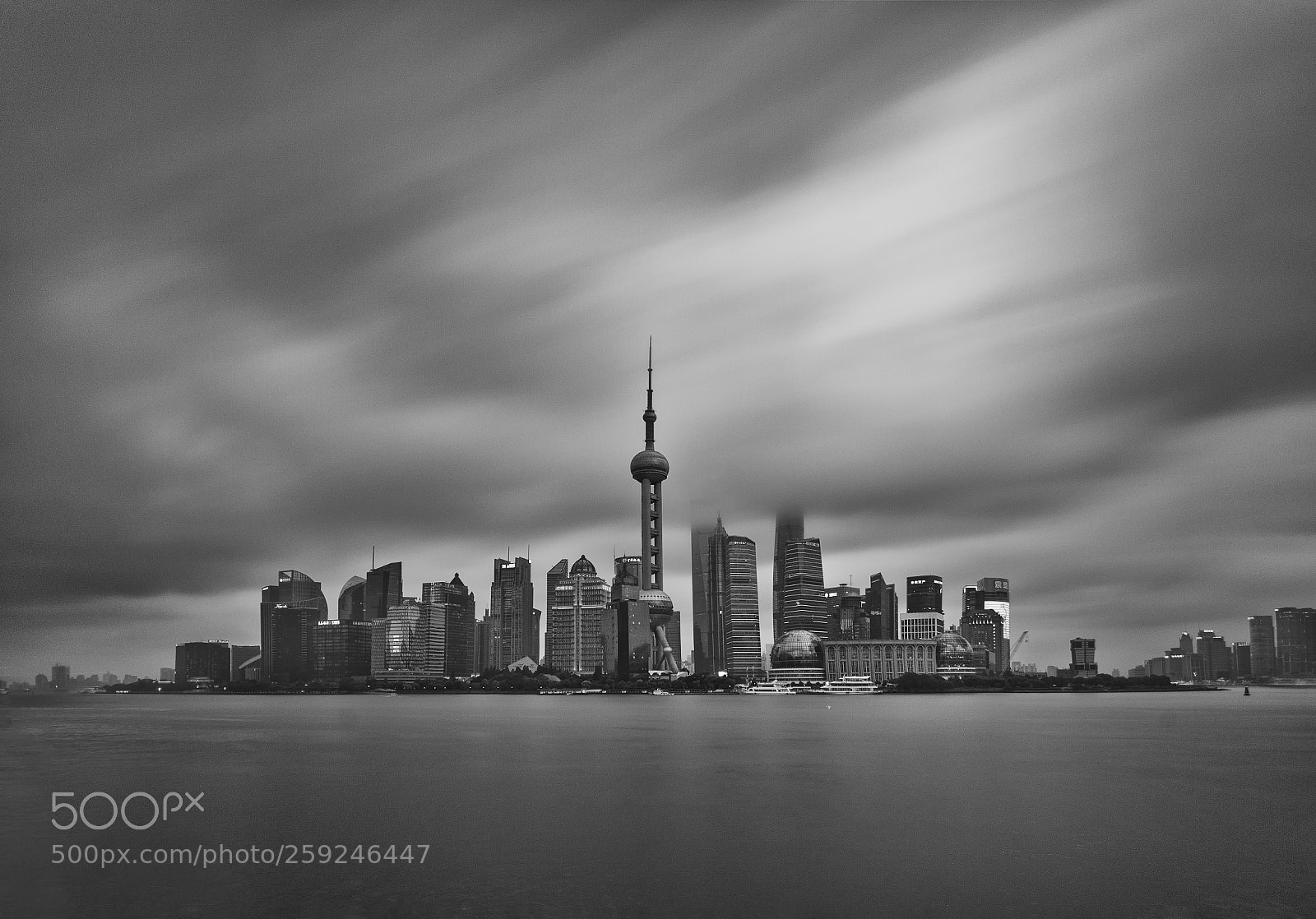 Canon EOS 5D Mark II sample photo. Clouds move through skyscrapers photography