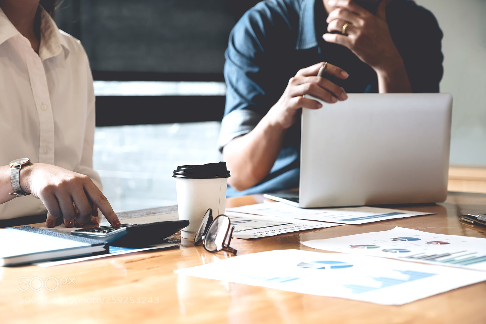 Fujifilm X-T2 sample photo. Business people analyzing statistics photography
