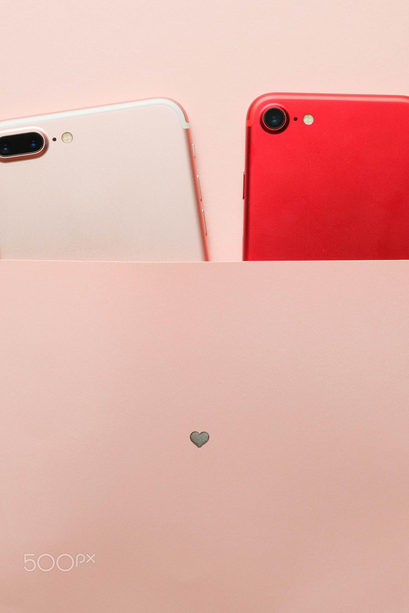 Two smartphones and heart. Valentines concept