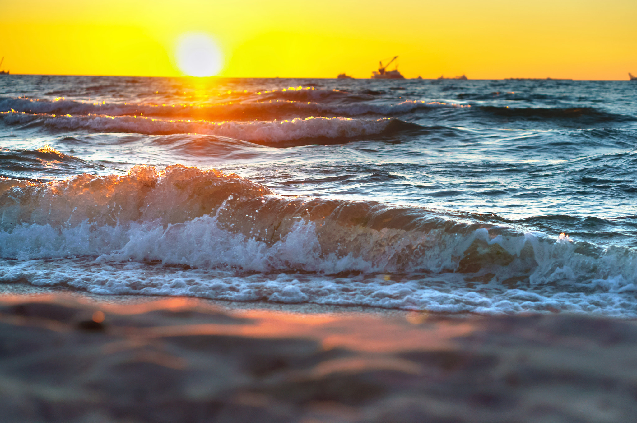 Sony Alpha NEX-3N sample photo. Red yellow sunset on the sea shore in the surf of the waves of the baltic sea and a magnificent... photography