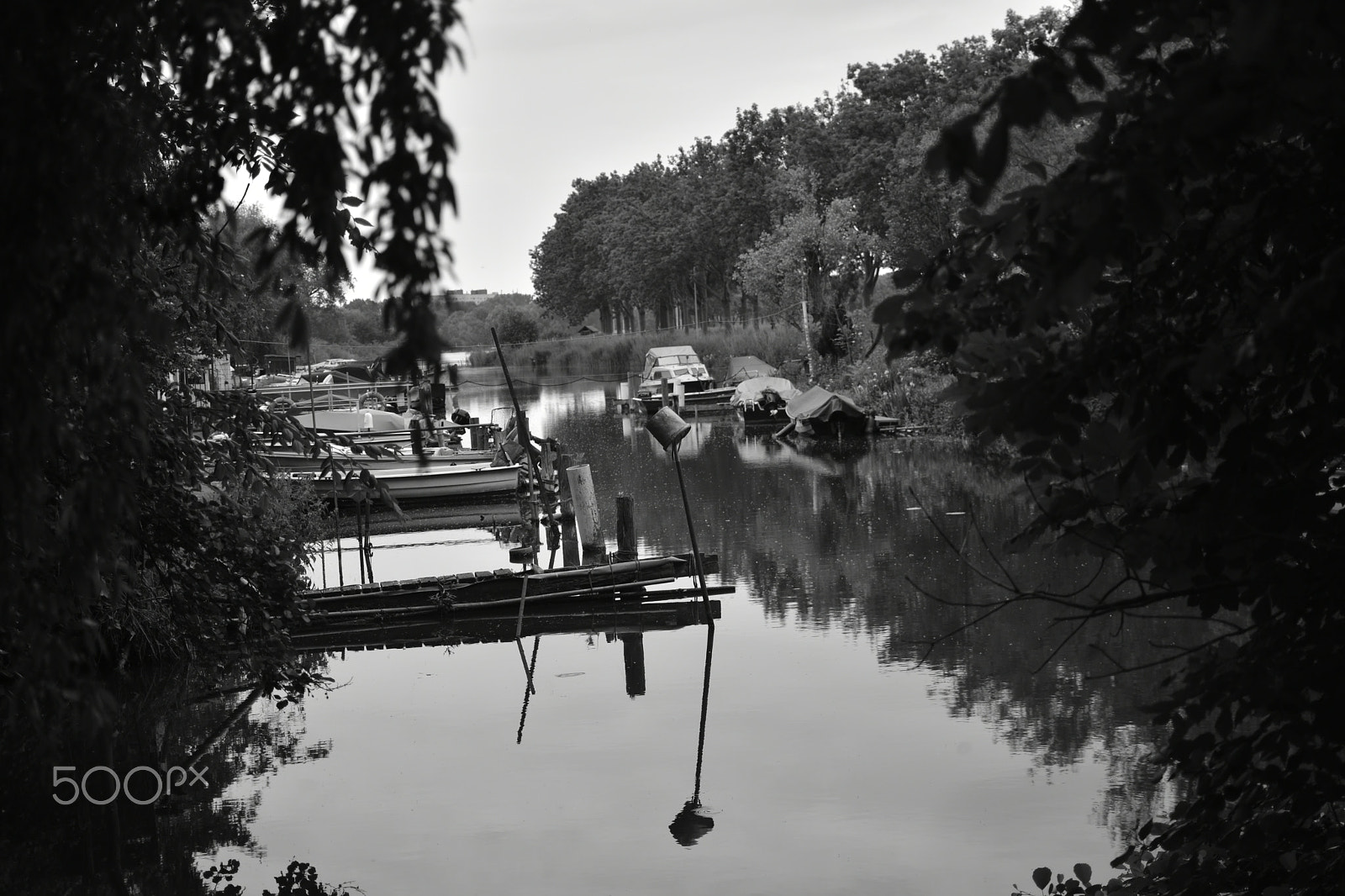 Nikon AF-S DX Nikkor 35mm F1.8G sample photo. Reflections on water photography