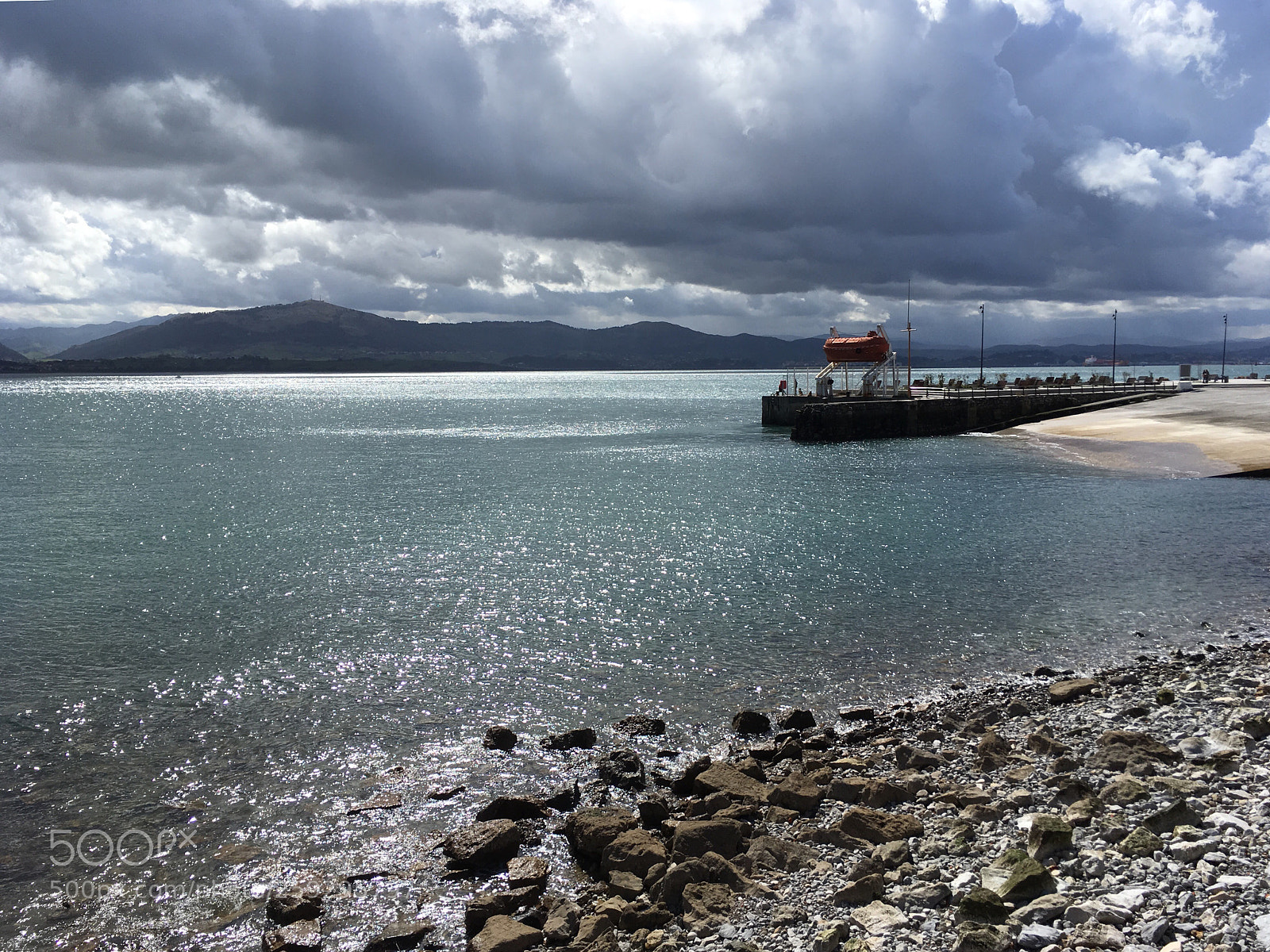 Apple iPhone SE sample photo. Santander between showers photography