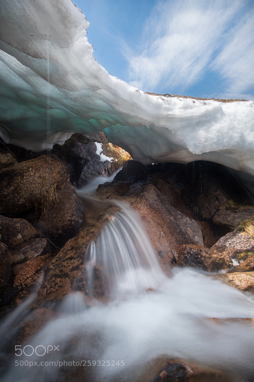 Fujifilm X-T20 sample photo. Snow melt over rocks photography
