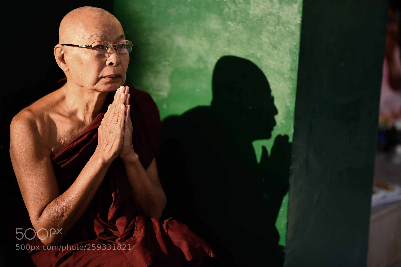 Nikon D750 sample photo. Praying monk in pagoda photography