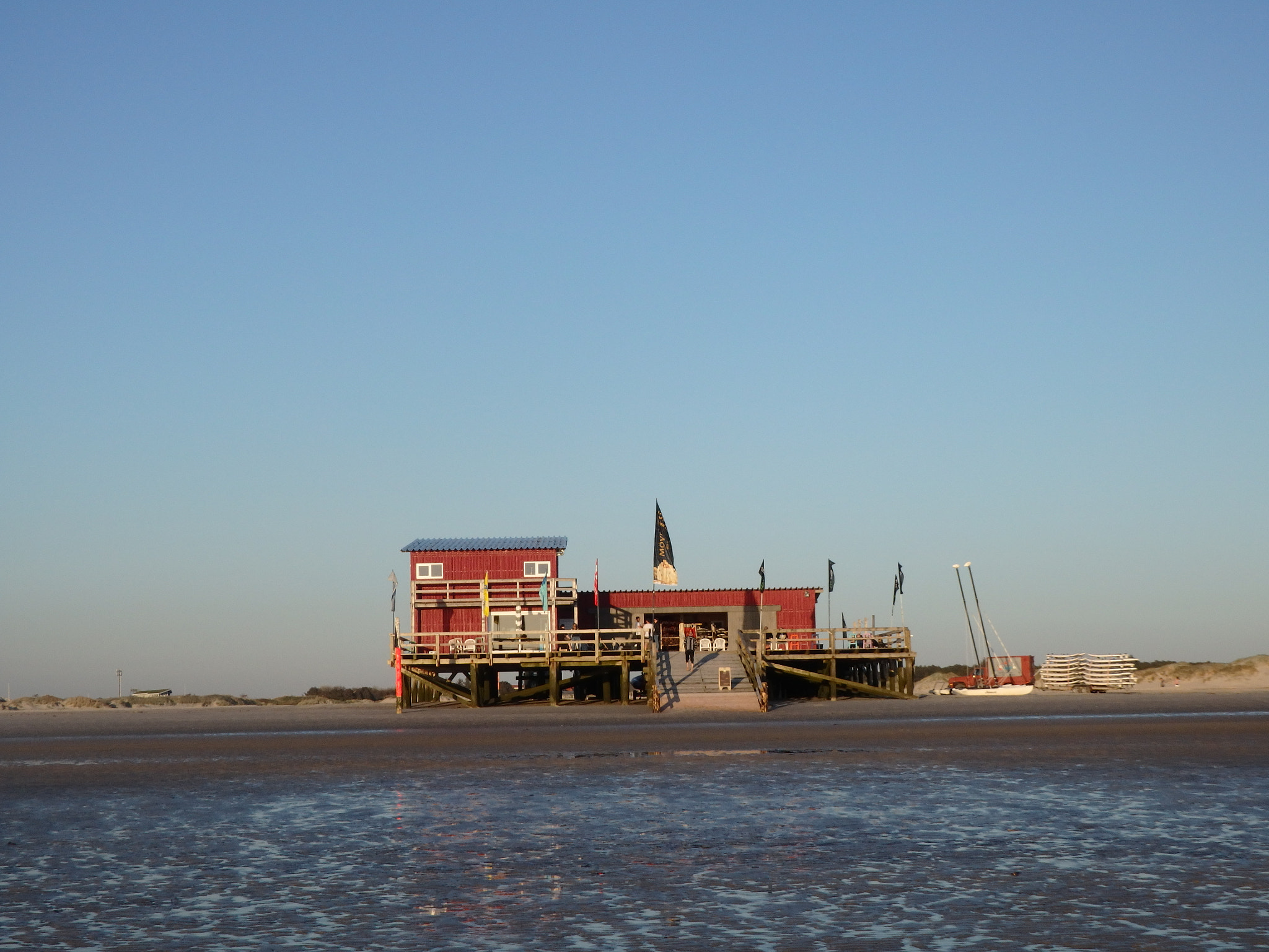 Olympus SH-2 sample photo. School house by the water spo photography