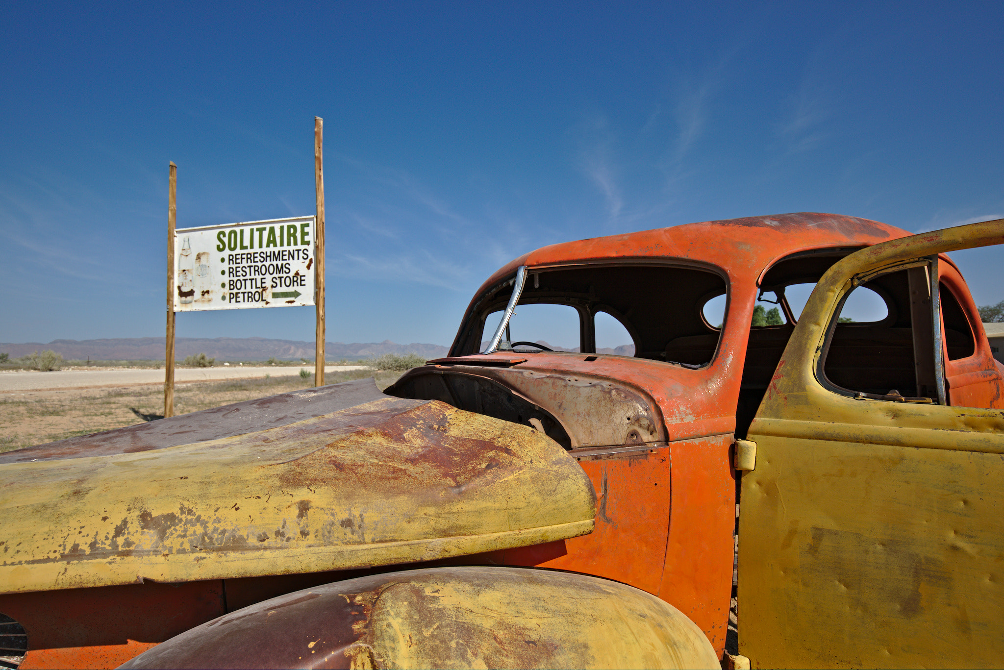 Canon EF 16-35mm F4L IS USM sample photo. Car at solitaire (namibia) photography