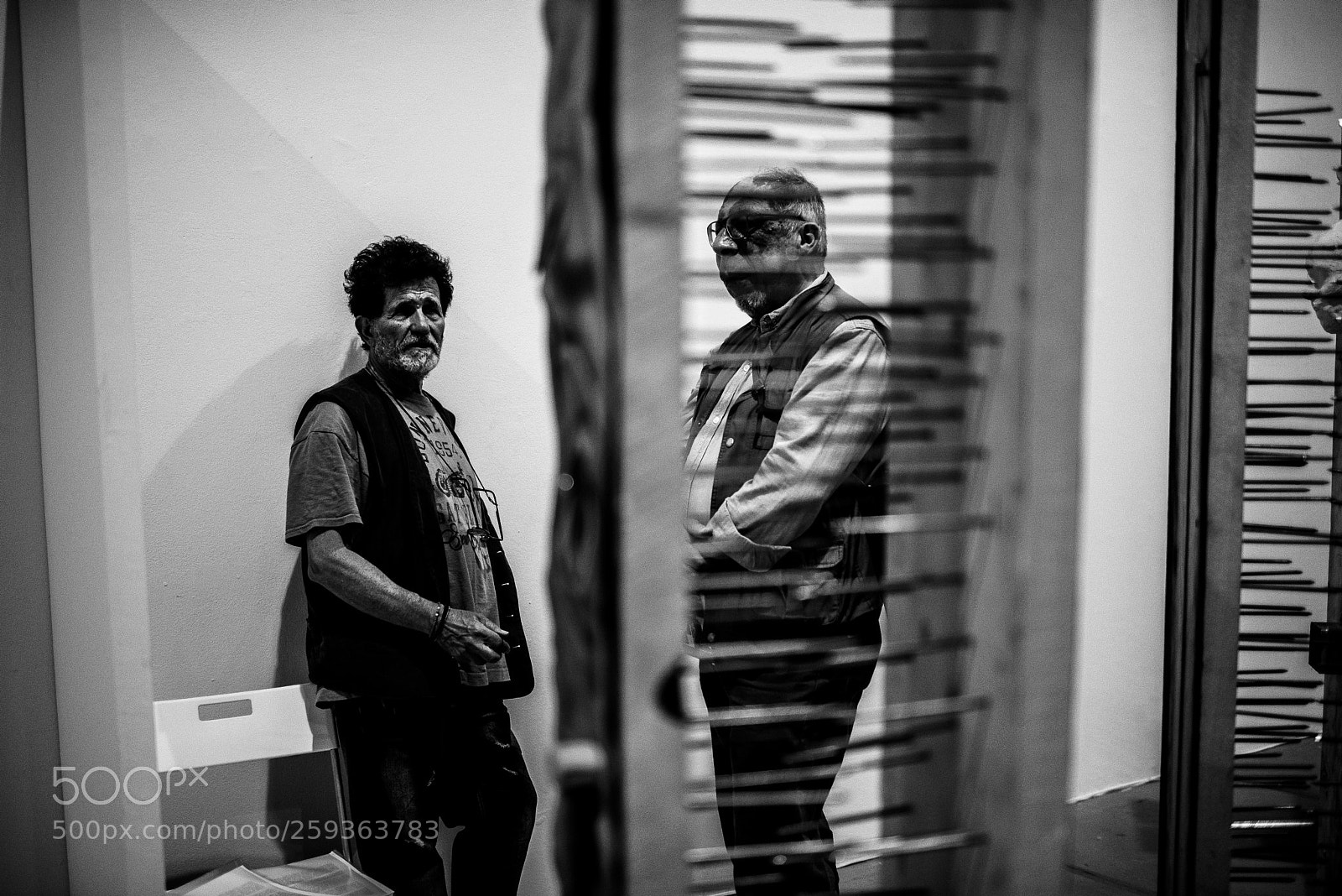 Nikon D610 sample photo. Two visitors behind the photography