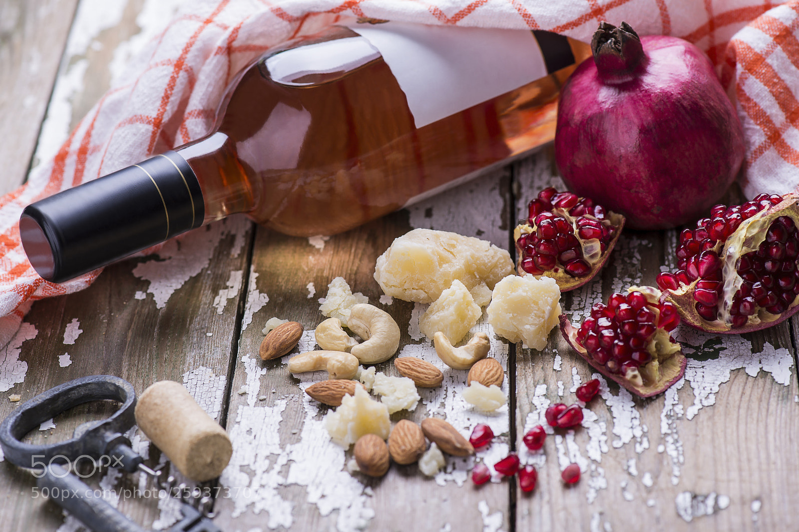 Nikon D610 sample photo. A bottle of rose photography