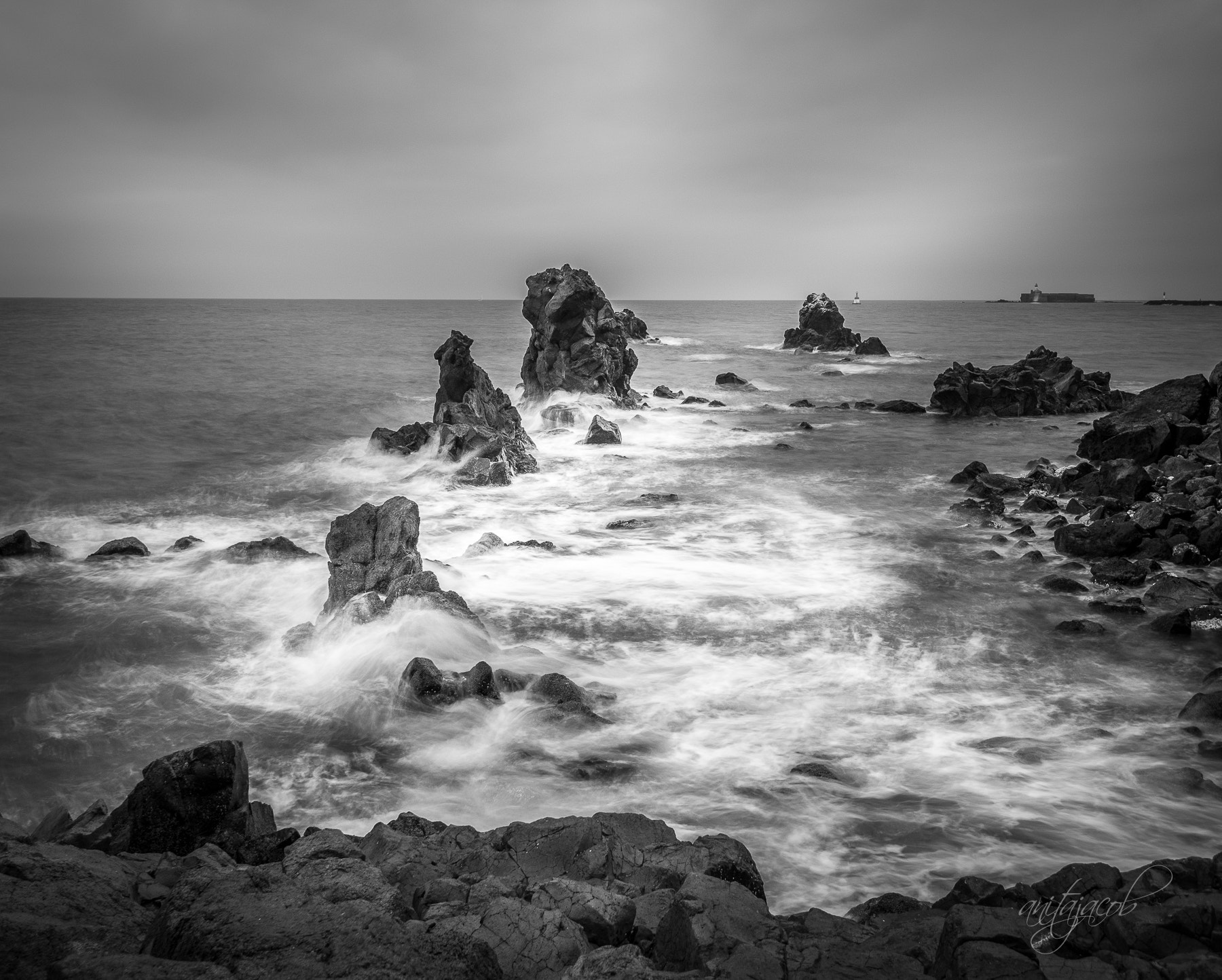 Panasonic Lumix DMC-G85 (Lumix DMC-G80) sample photo. Lava rocks of la conque beach b/w photography