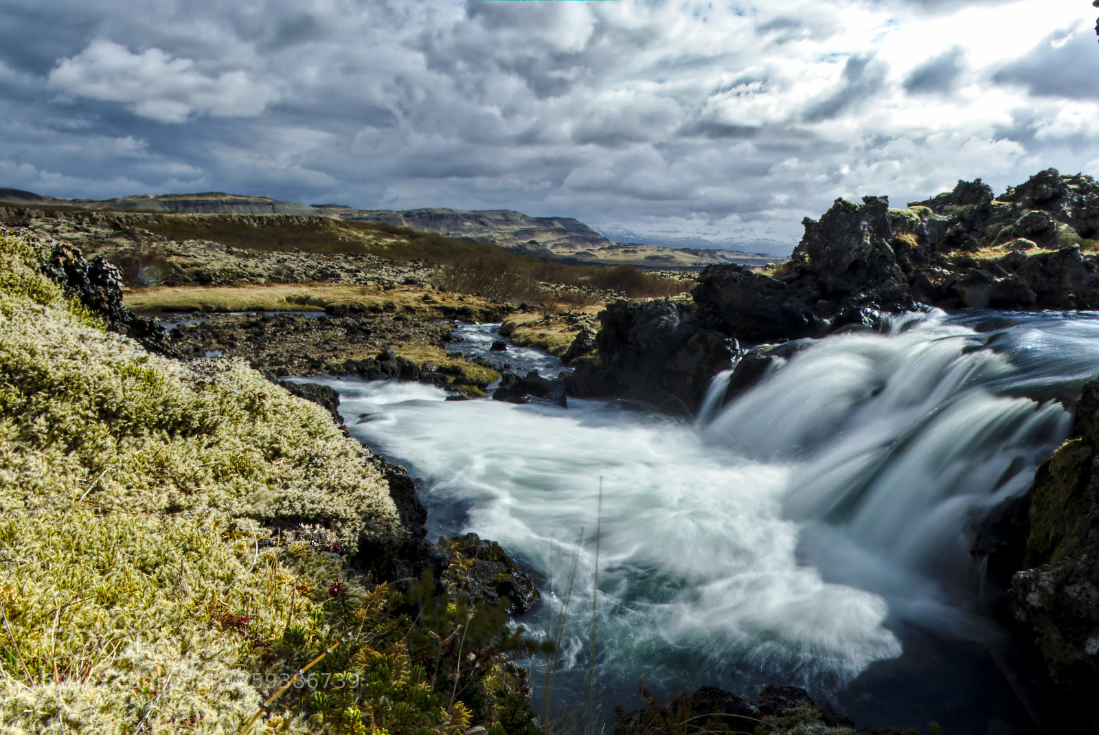Fujifilm X-T20 sample photo. Waterfall hidden in lava photography
