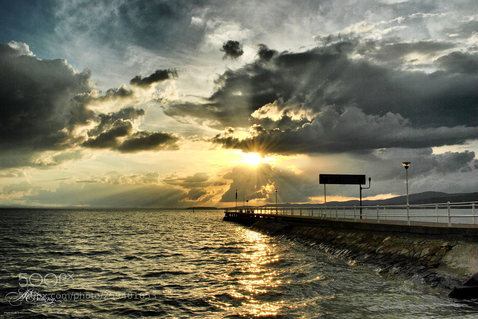 Nikon D3000 sample photo. Non ogni nube porta photography