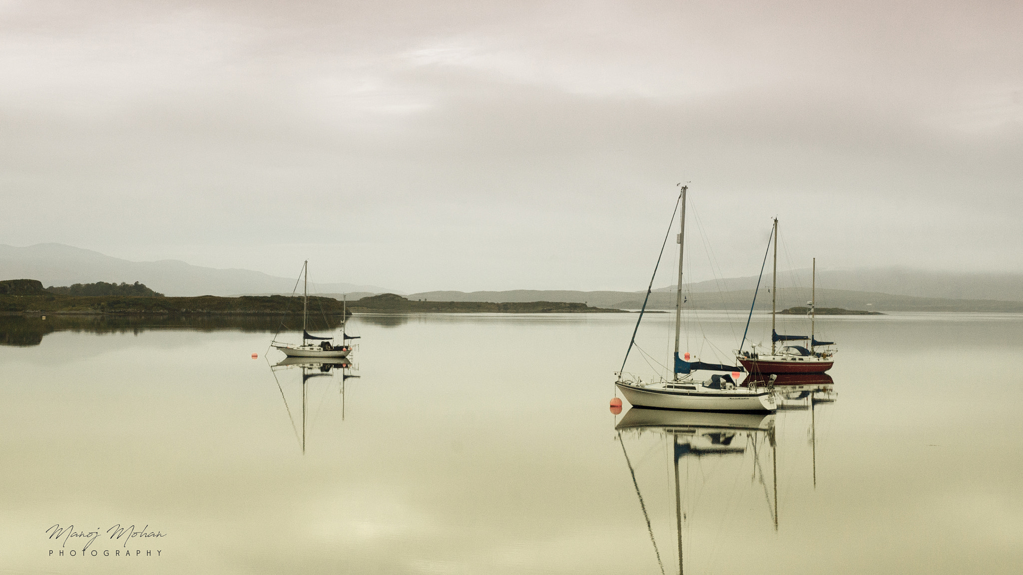 Sony Alpha DSLR-A550 sample photo. Boats at oban photography