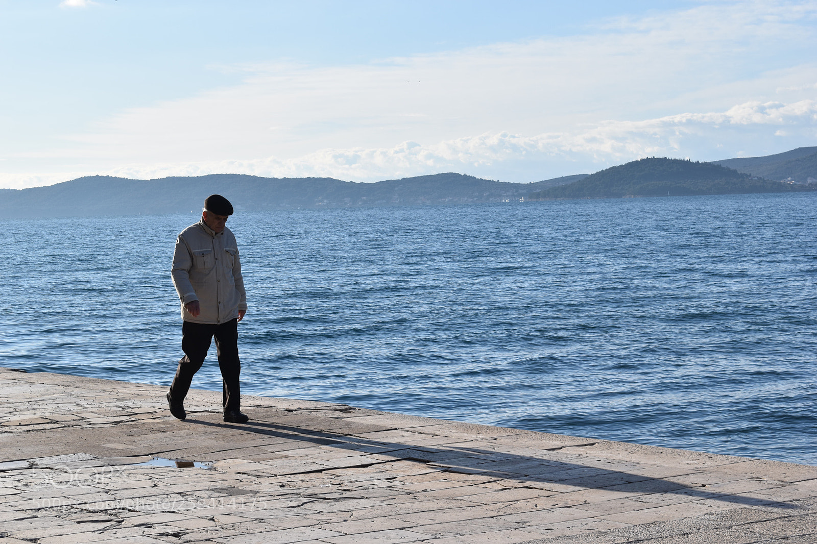 Nikon D5500 sample photo. A old man walking photography