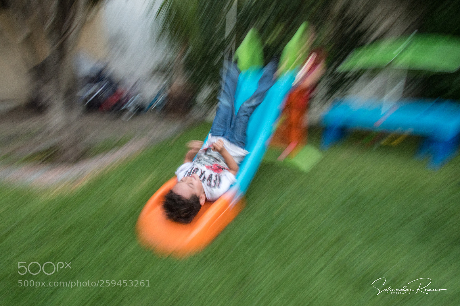 Nikon D7500 sample photo. My grandson sliding upside photography
