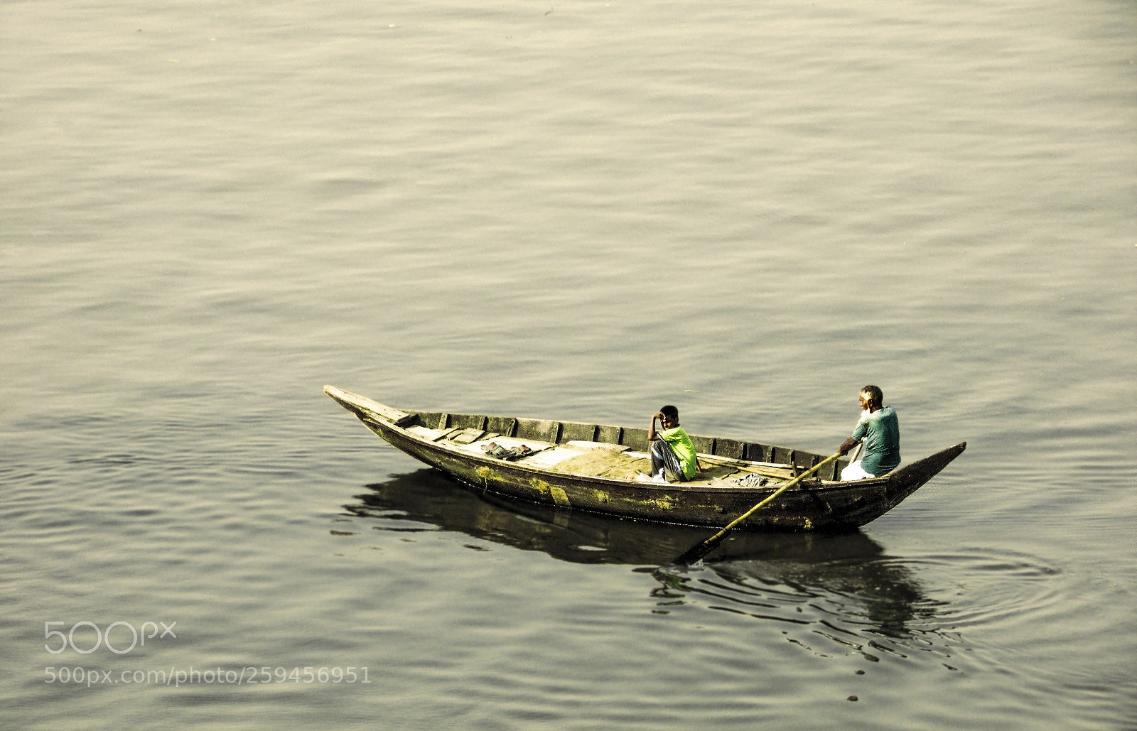Canon PowerShot SX400 IS sample photo. Boatman in river photography