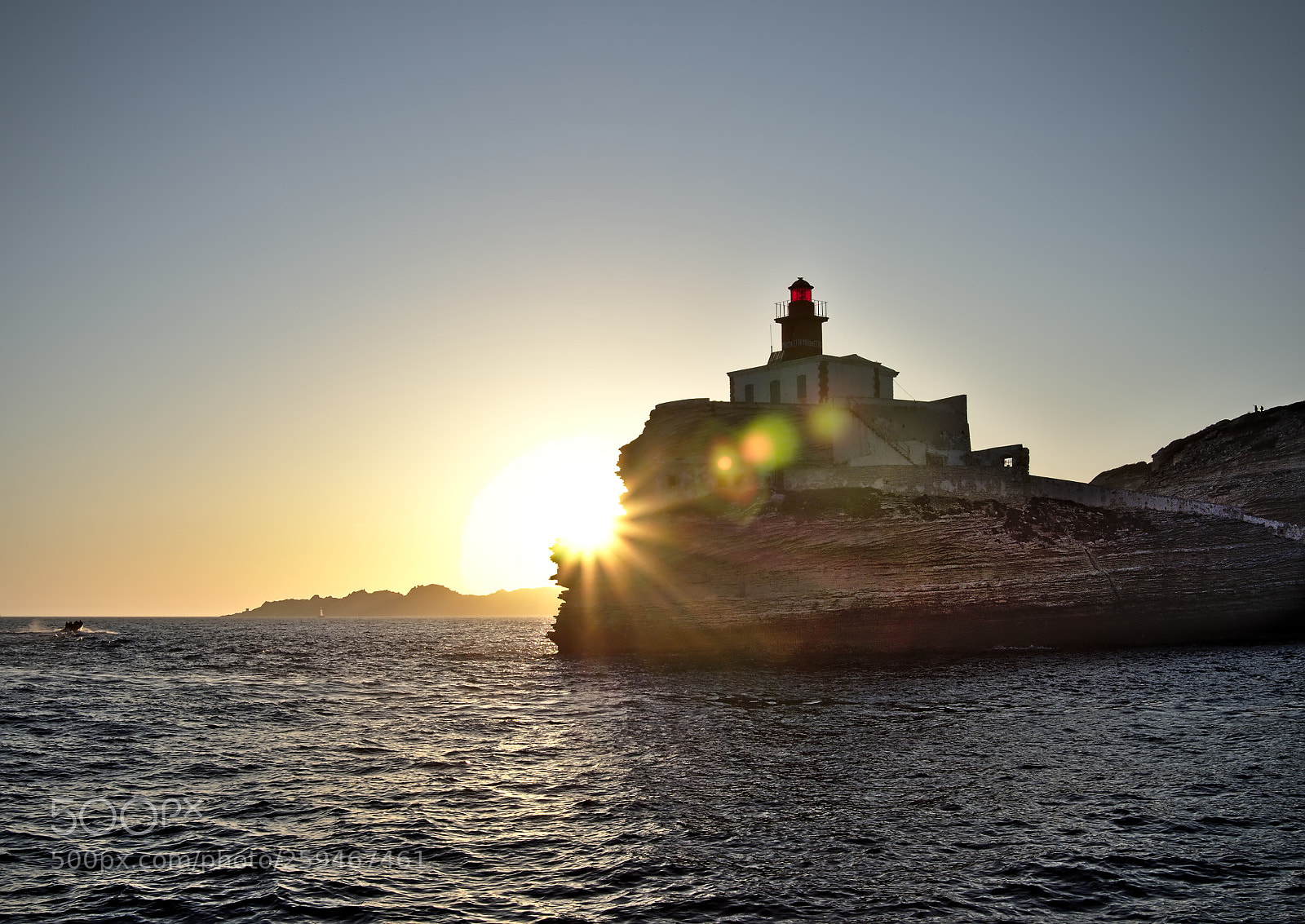 Olympus OM-D E-M5 II sample photo. Sunset behind lighthouse photography