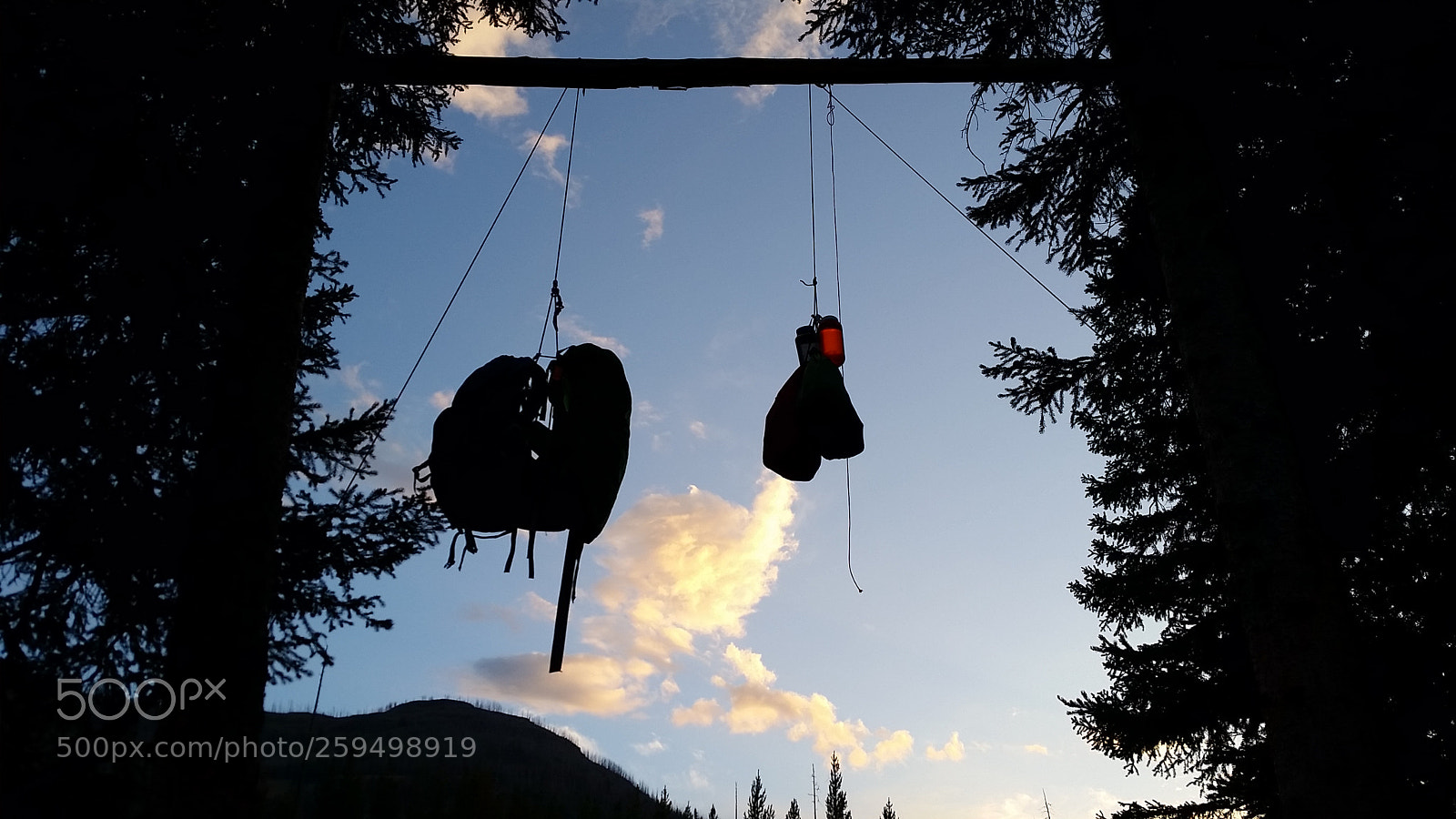Samsung Galaxy S5 sample photo. Silhouette of hanging packs photography