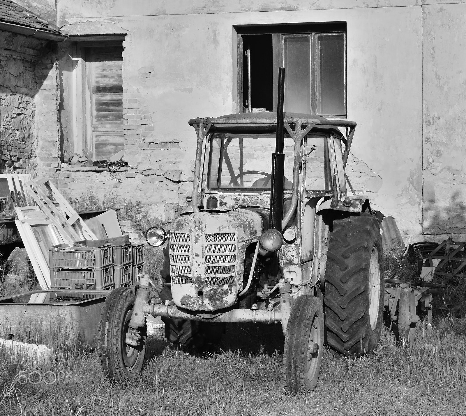 Nikon D5300 sample photo. Libesice, czech republic - may 19, 2018: wreck of old tractor in front of house in libesice... photography