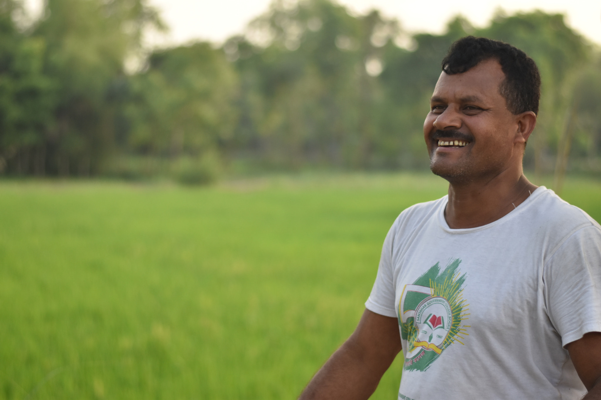Nikon D5500 + Nikon AF-S Nikkor 50mm F1.8G sample photo. Farmer's smile.jpg photography