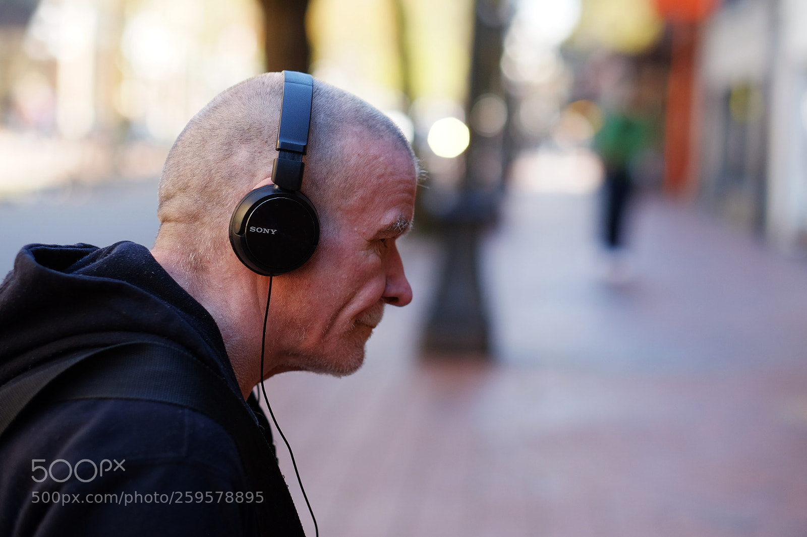 Fujifilm X-T1 sample photo. What are you listening photography