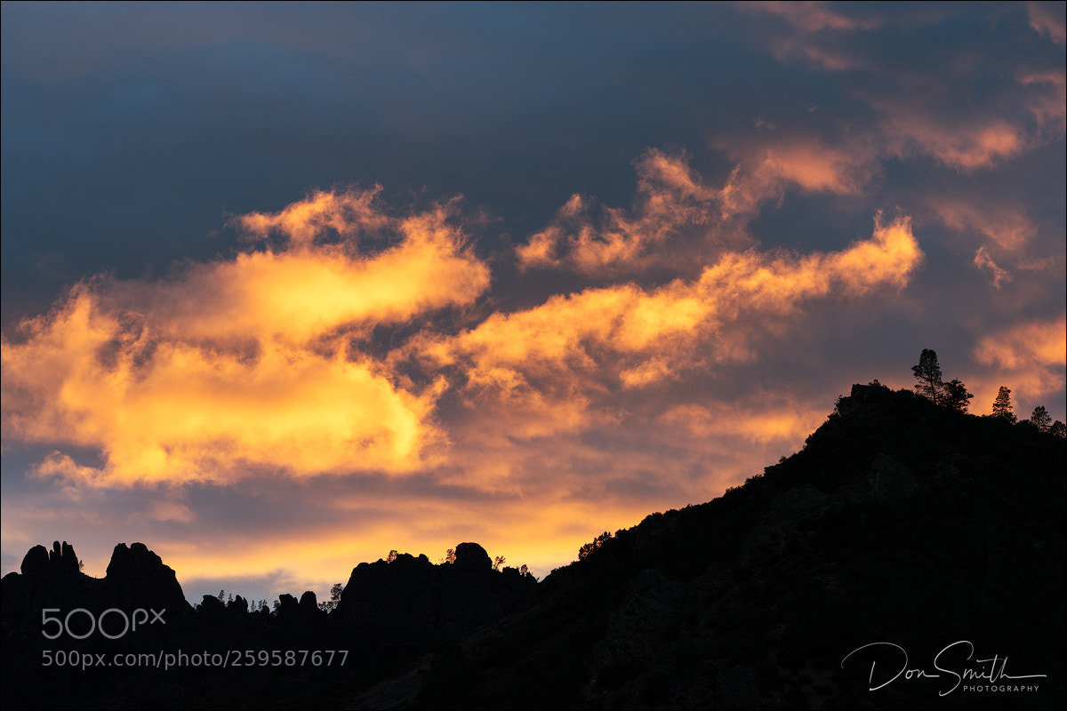 Sony a7R III sample photo. Sunset-lit clouds over high photography