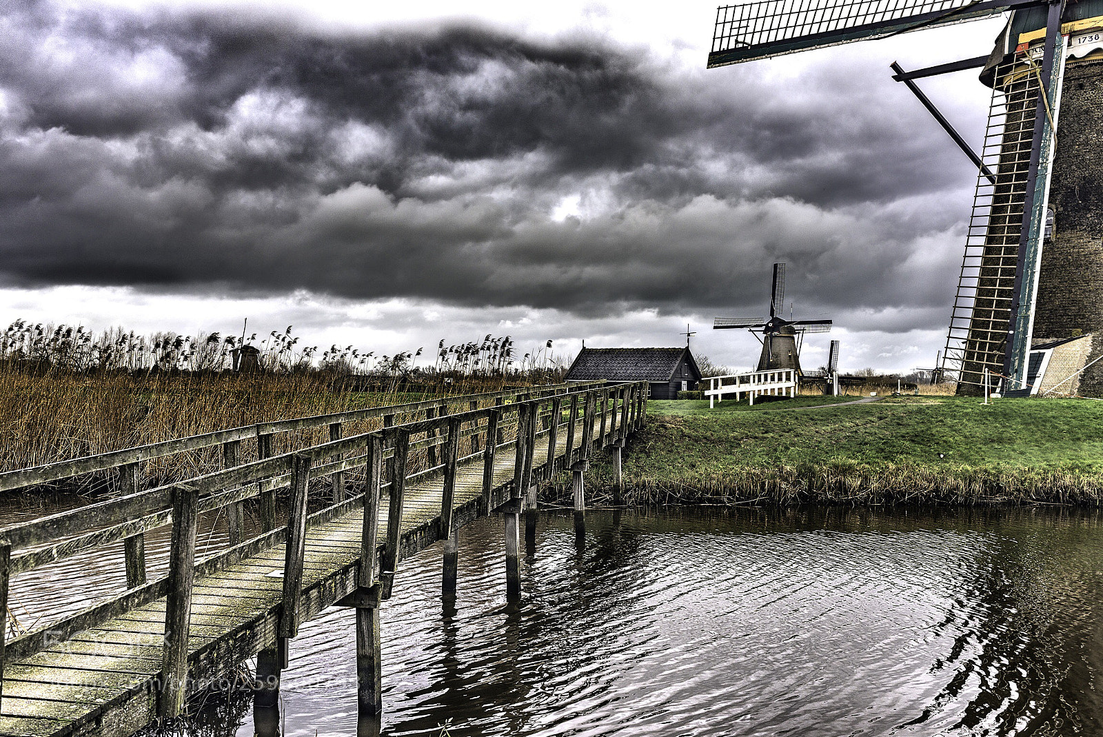 Nikon D610 sample photo. Cloudy day in kinderdijk photography